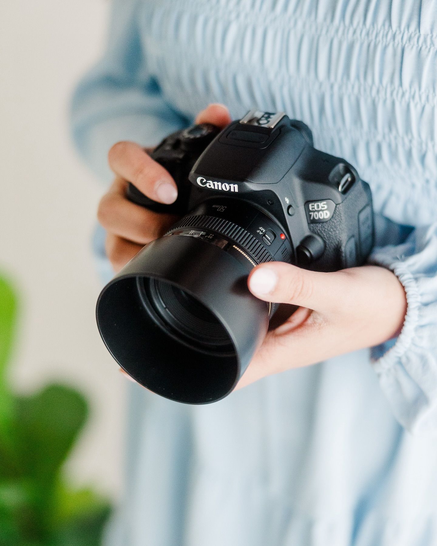 Photographer holding a camera