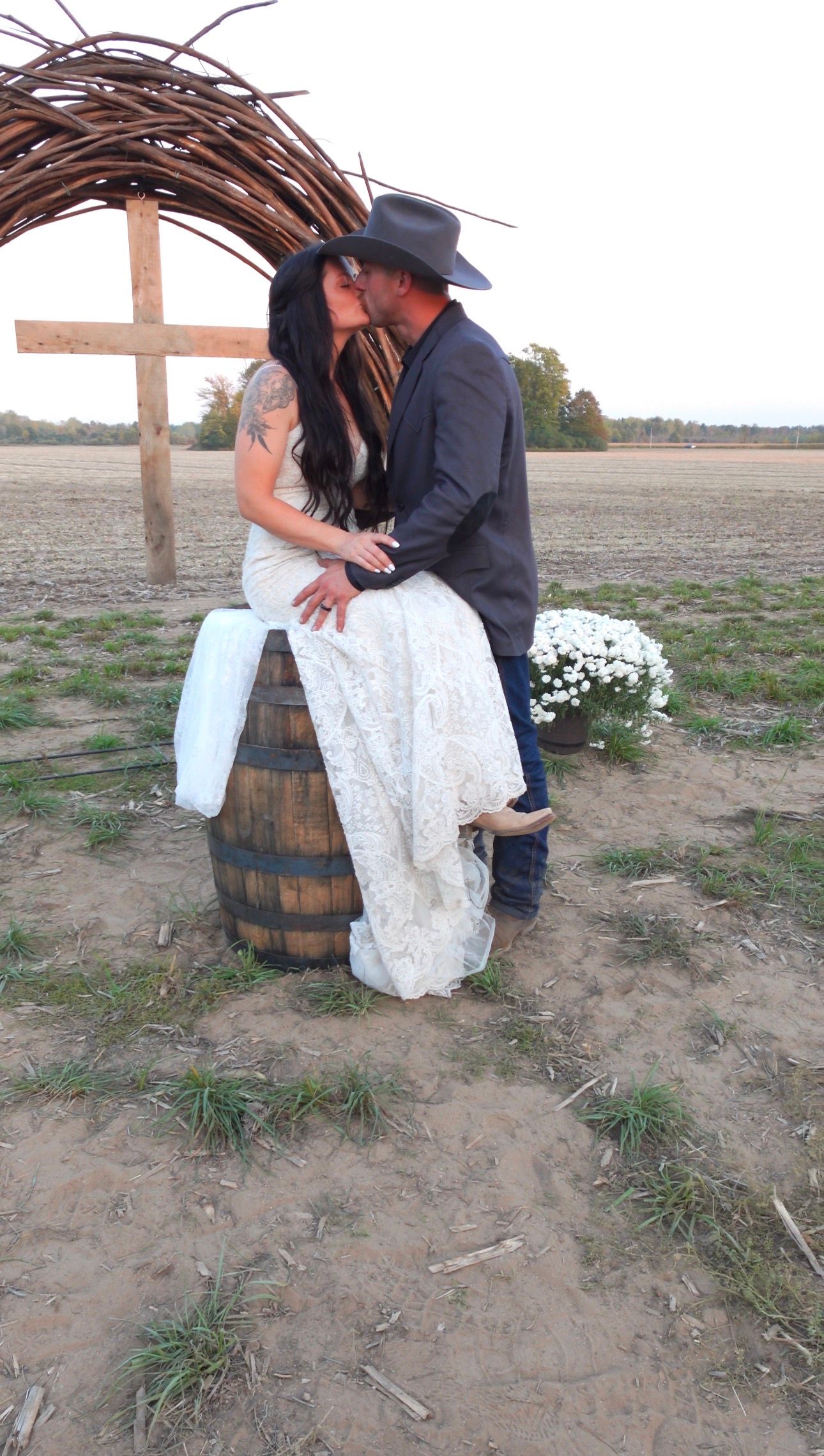 Romantic sunset portrait of a bride and groom celebrating their wedding day together.