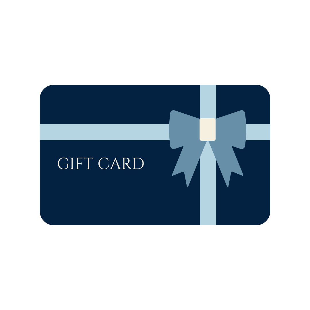 Navy blue gift card with light blue ribbon and bow on dark background.