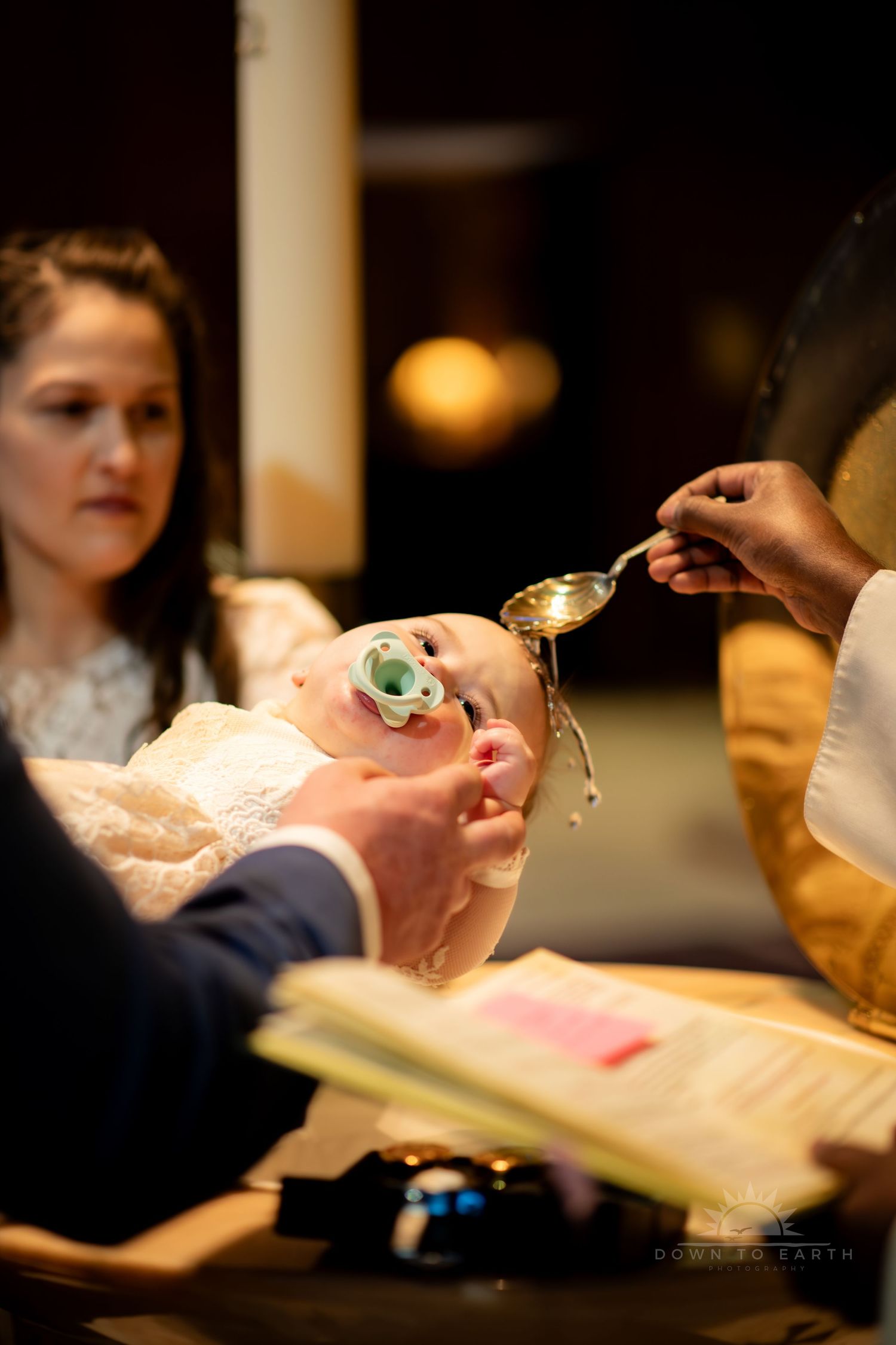 Baby during a baptism ceremony in church.