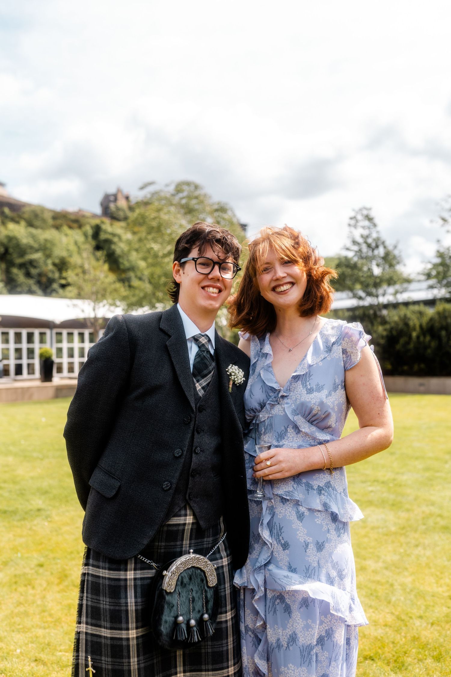brother of a groom  outside of the Glass House, Edinburgh, Scotland.