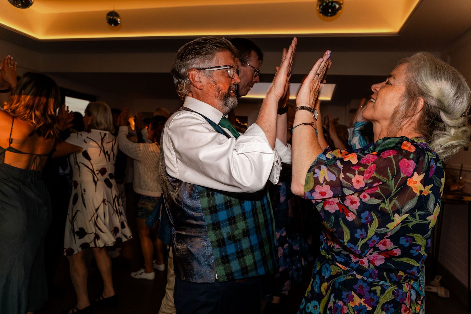 Wedding guest dancing, Whitekirk Hill, Whitekirk, North Berwick