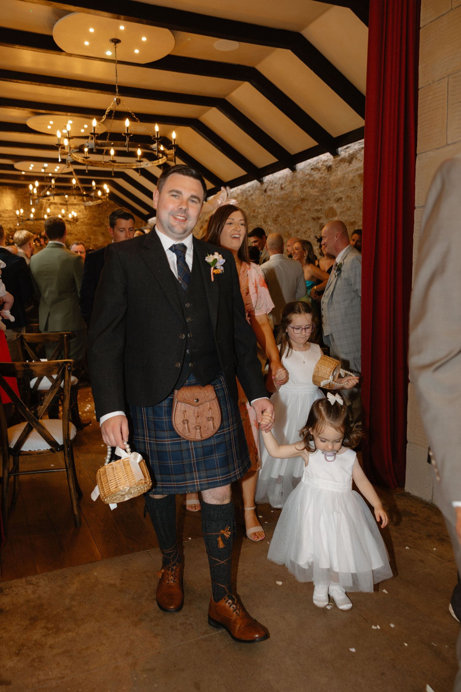 Wedding ceremony, walking down the isle, at Rosebery Steading, Temple, Gorebridge, Scotland.