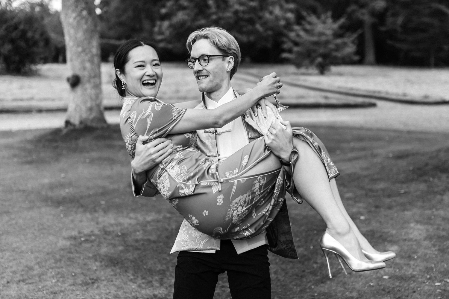 Playful outdoor portraits of couple in formal traditional and modern attire.