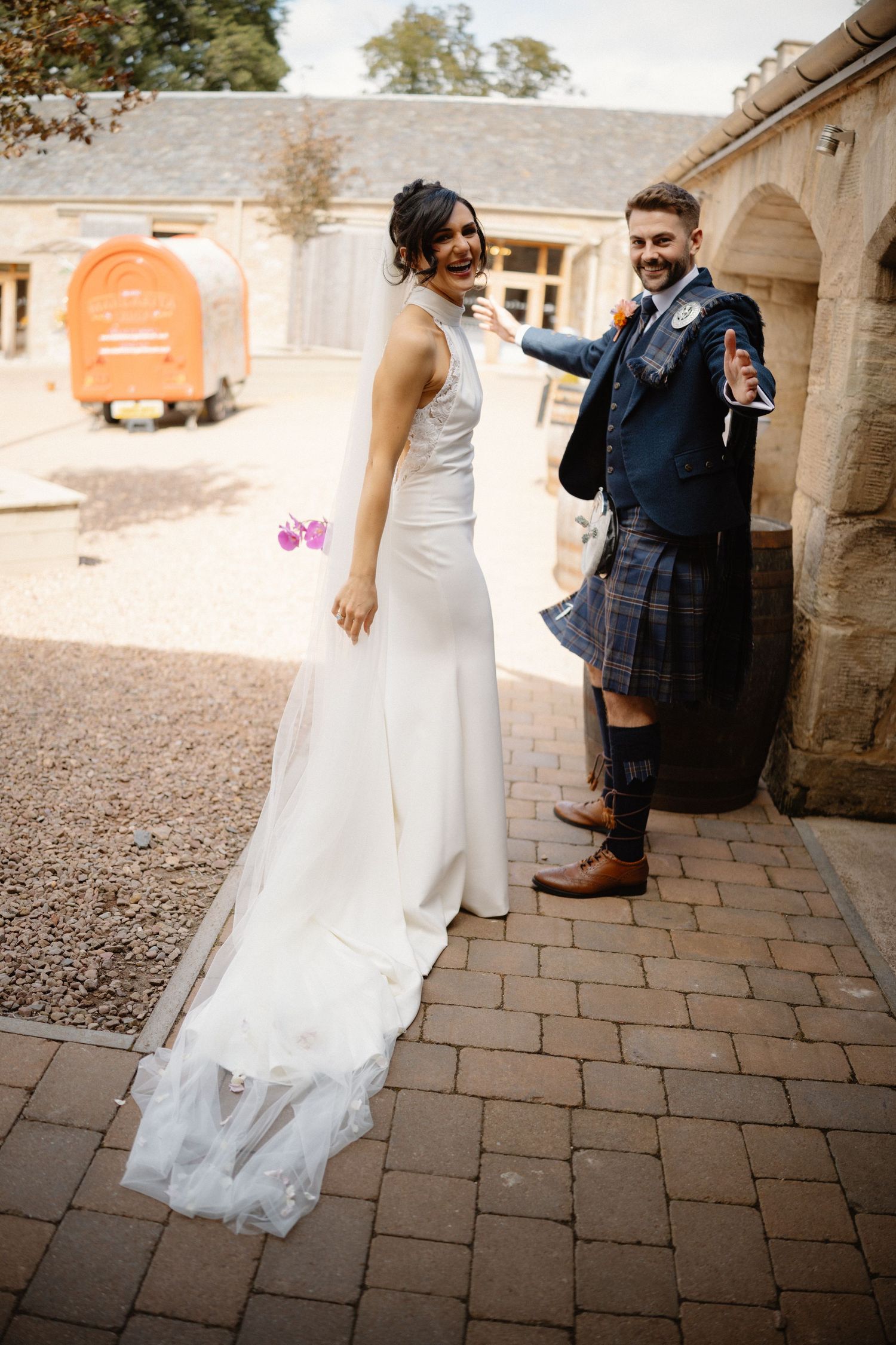 Wedding married couple courtyard at Rosebery Steading, Temple, Gorebridge, Scotland.