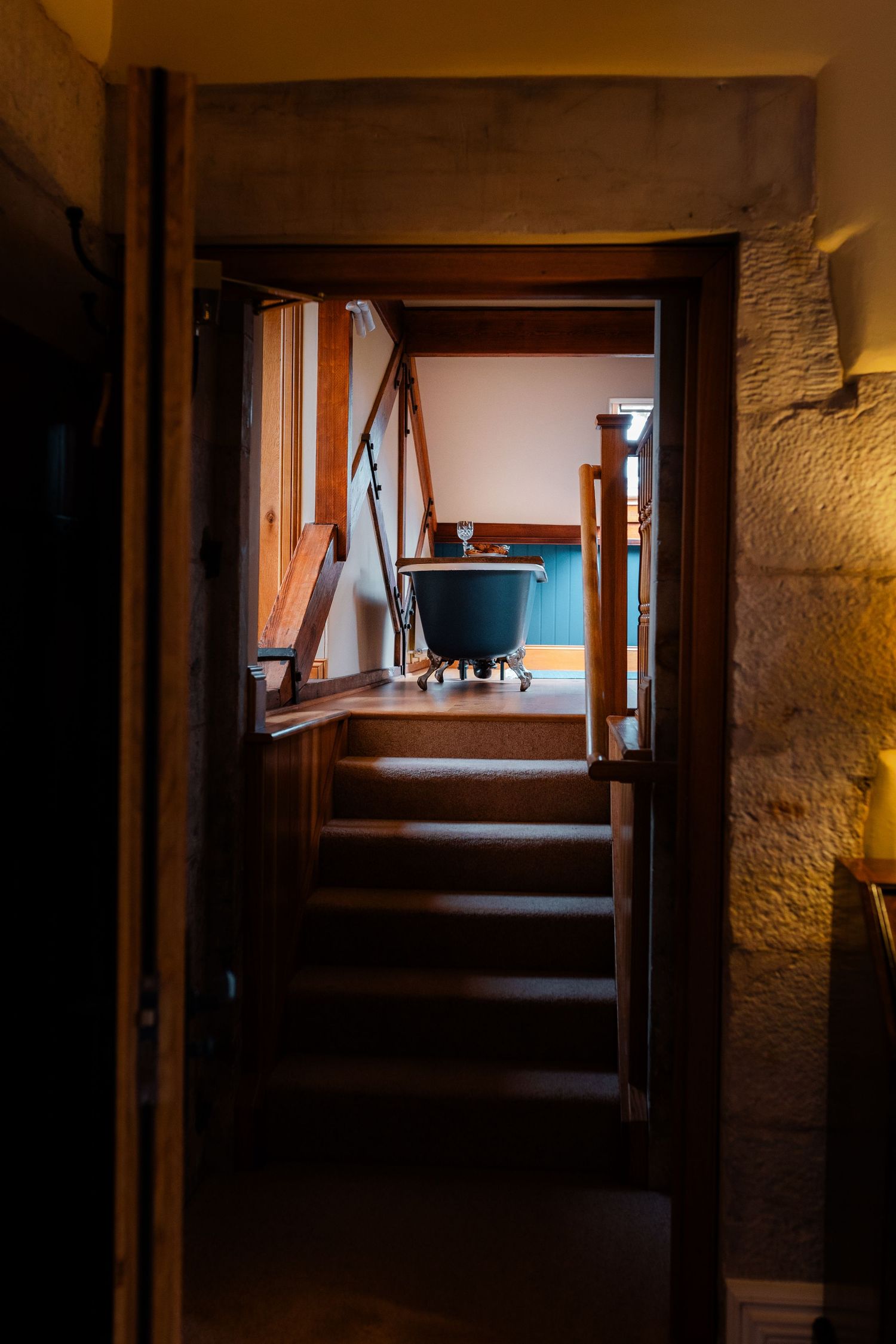 A series of dark hallway shots showing progressively deeper views through doorways in a dimly lit interior space.