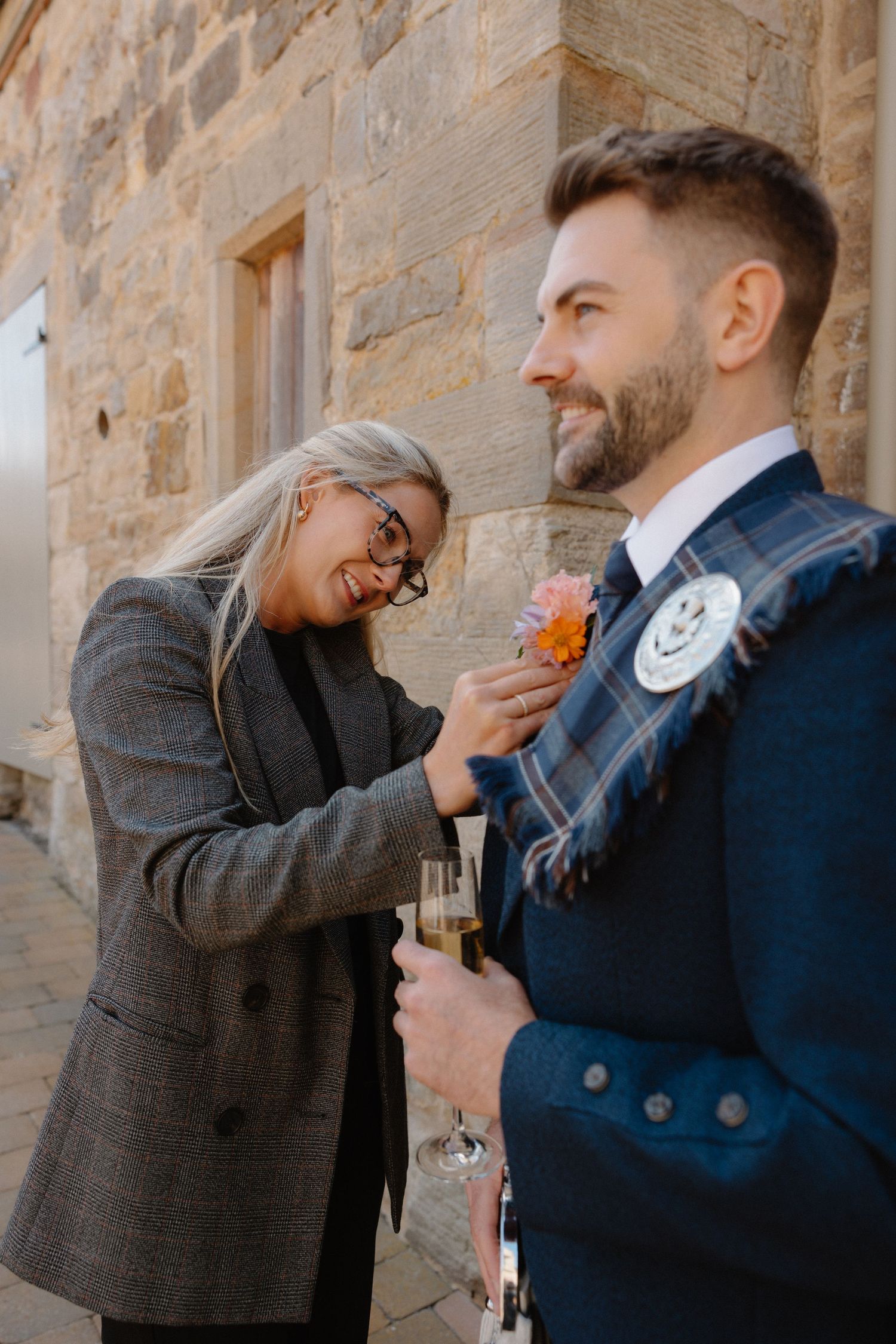 Groom getting ready at Rosebery Steading, Temple, Gorebridge, Scotland.