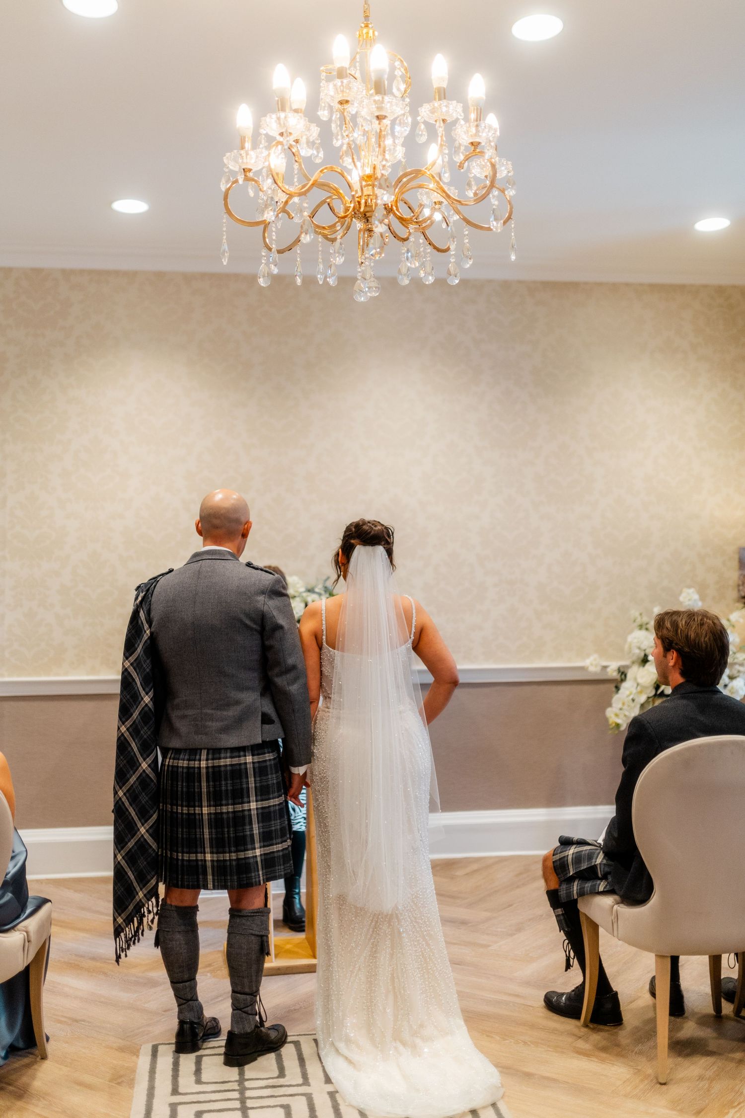 Couple getting married, walking the isle, City Chambers wedding in Edinburgh, Scotland,