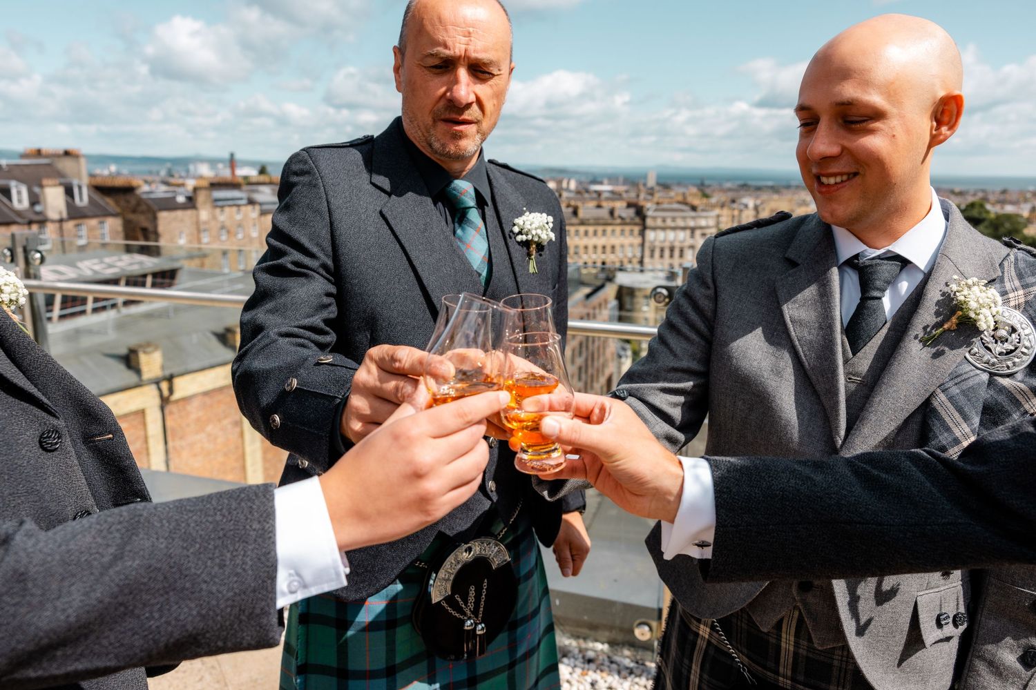 Groom having drink with his pals, Glass House Edinburgh, Scotland,