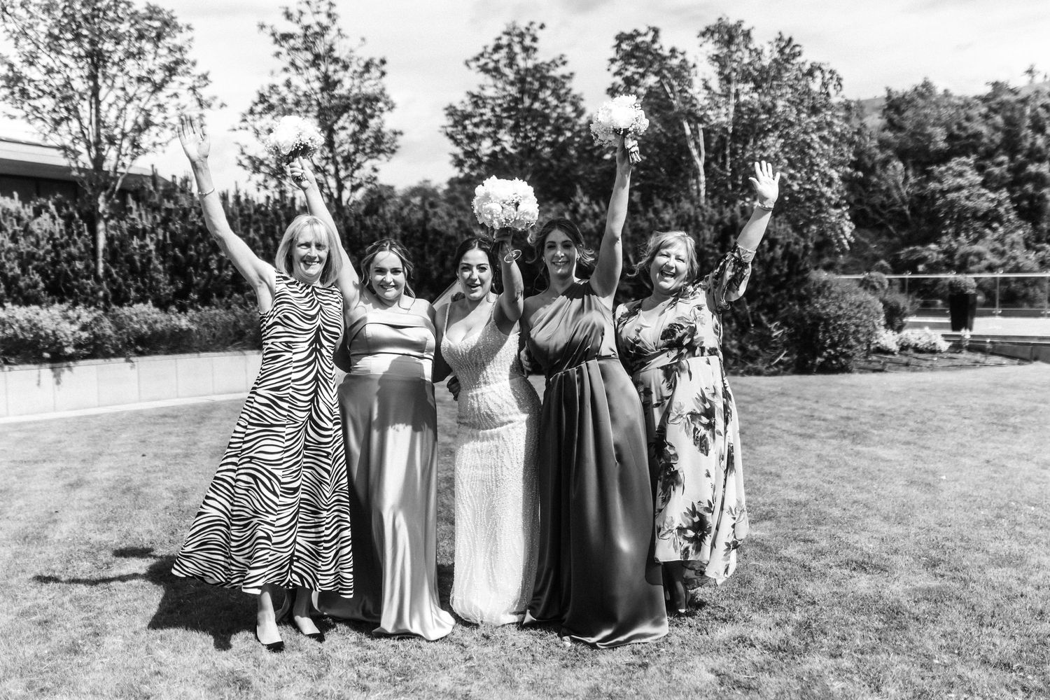 Happy women outside of the Glass House, Edinburgh, Scotland.