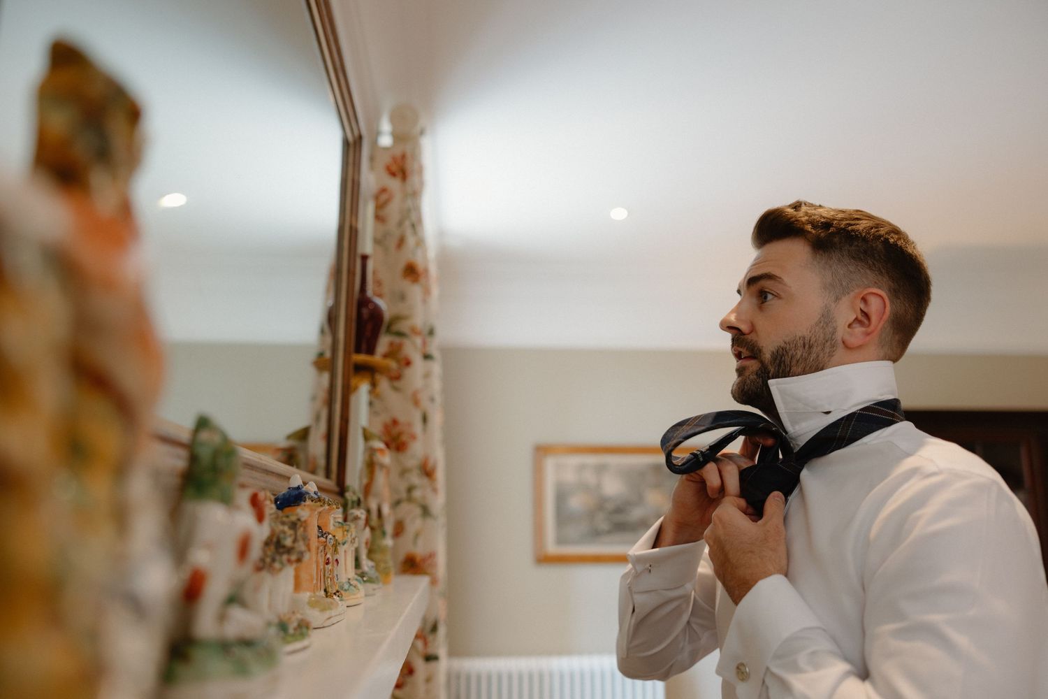 Groom getting ready Wedding at Rosebery Steading, Temple, Gorebridge, Scotland.