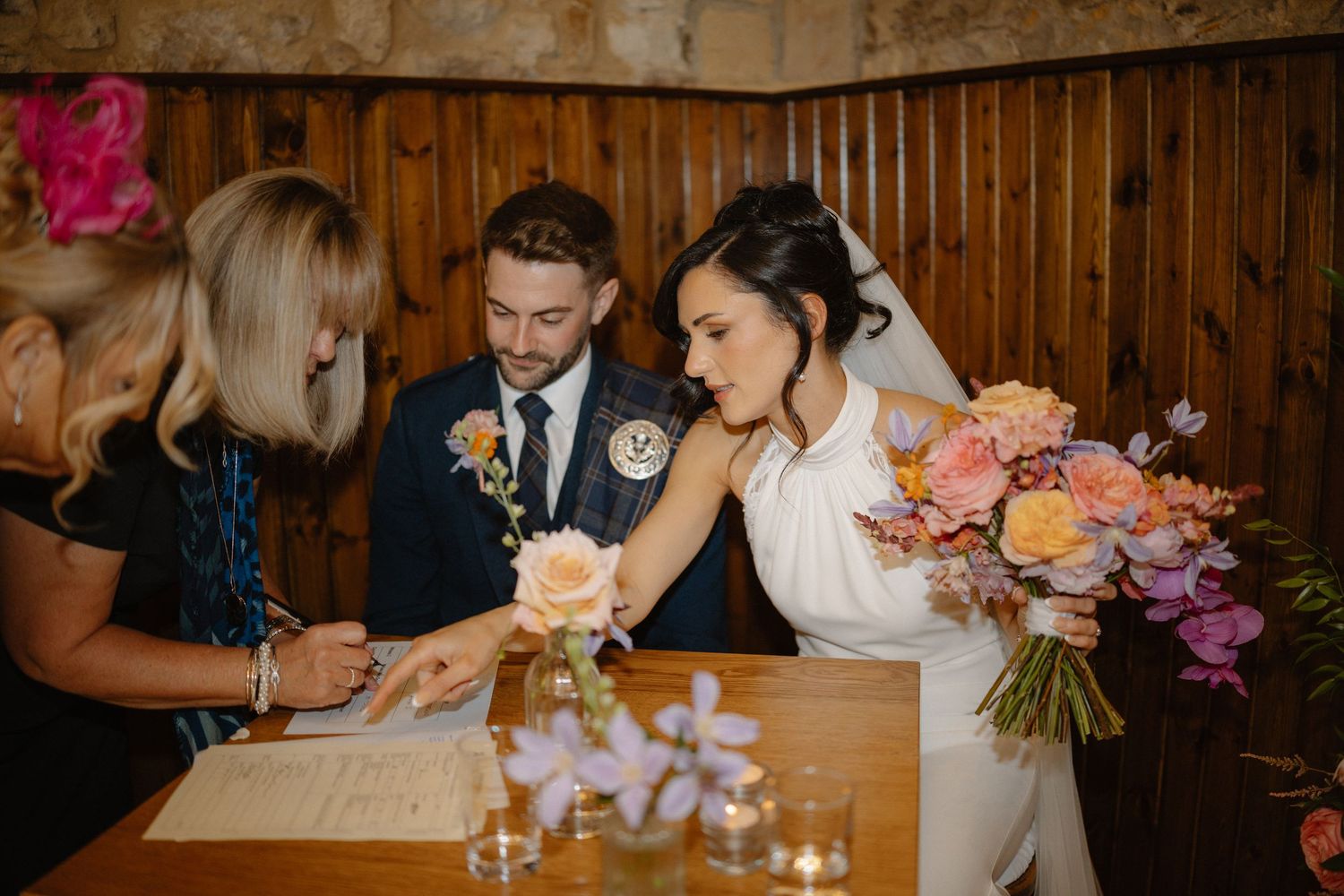 Wedding ceremony, signing, at Rosebery Steading, Temple, Gorebridge, Scotland.