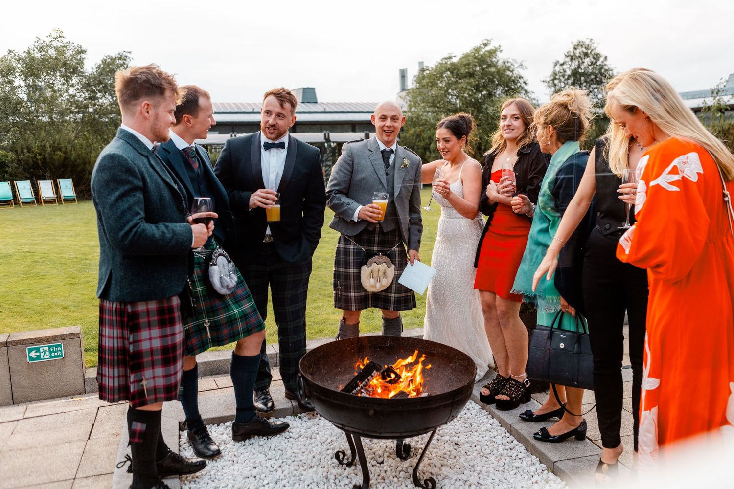 Guests chatting outside, wedding, Glass House Edinburgh City Scotland,