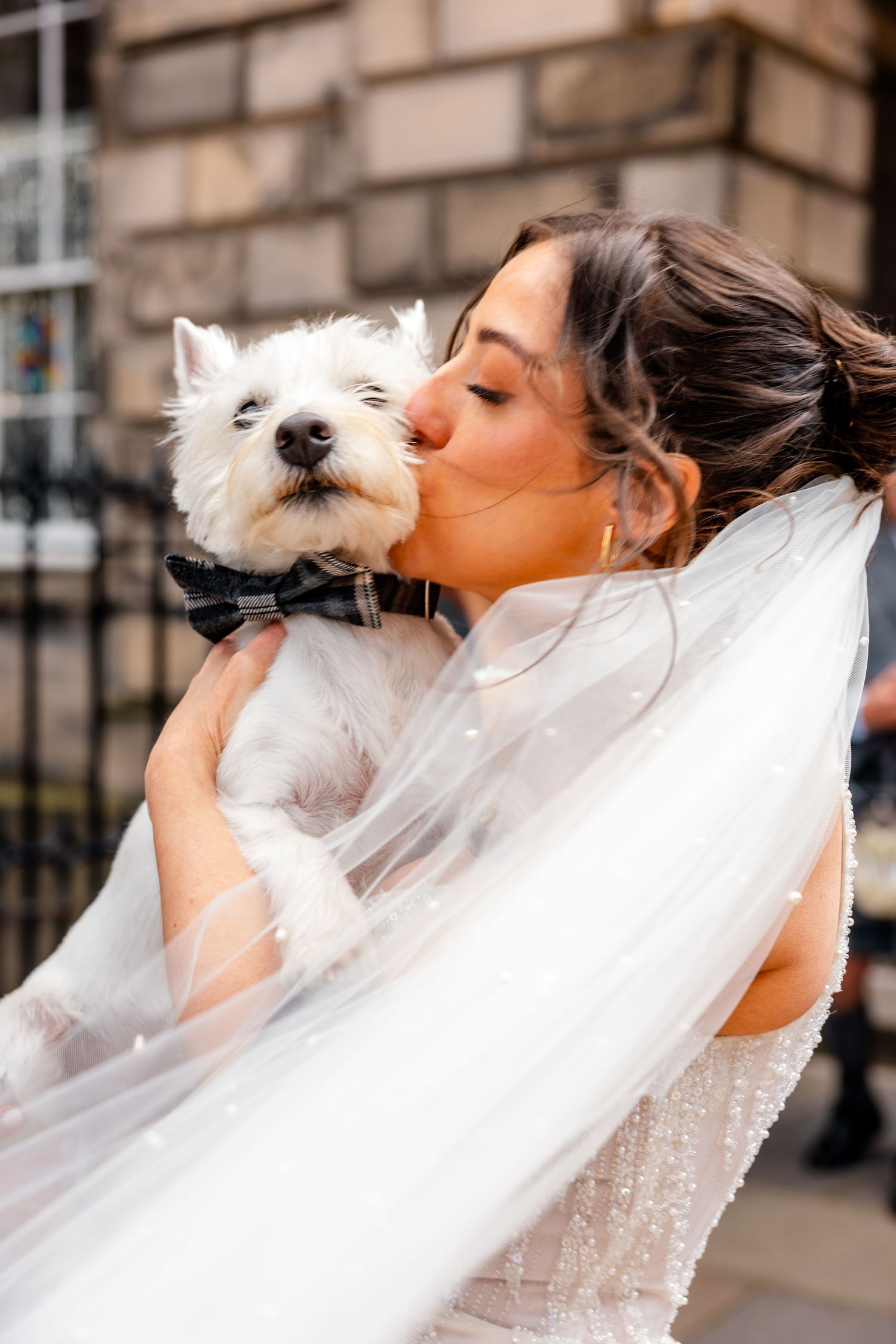 Bride with her dog outside, City Chambers wedding in Edinburgh, Scotland,