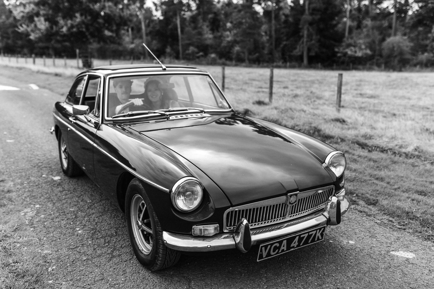 Vintage MG sports car photographed from multiple angles on country road.