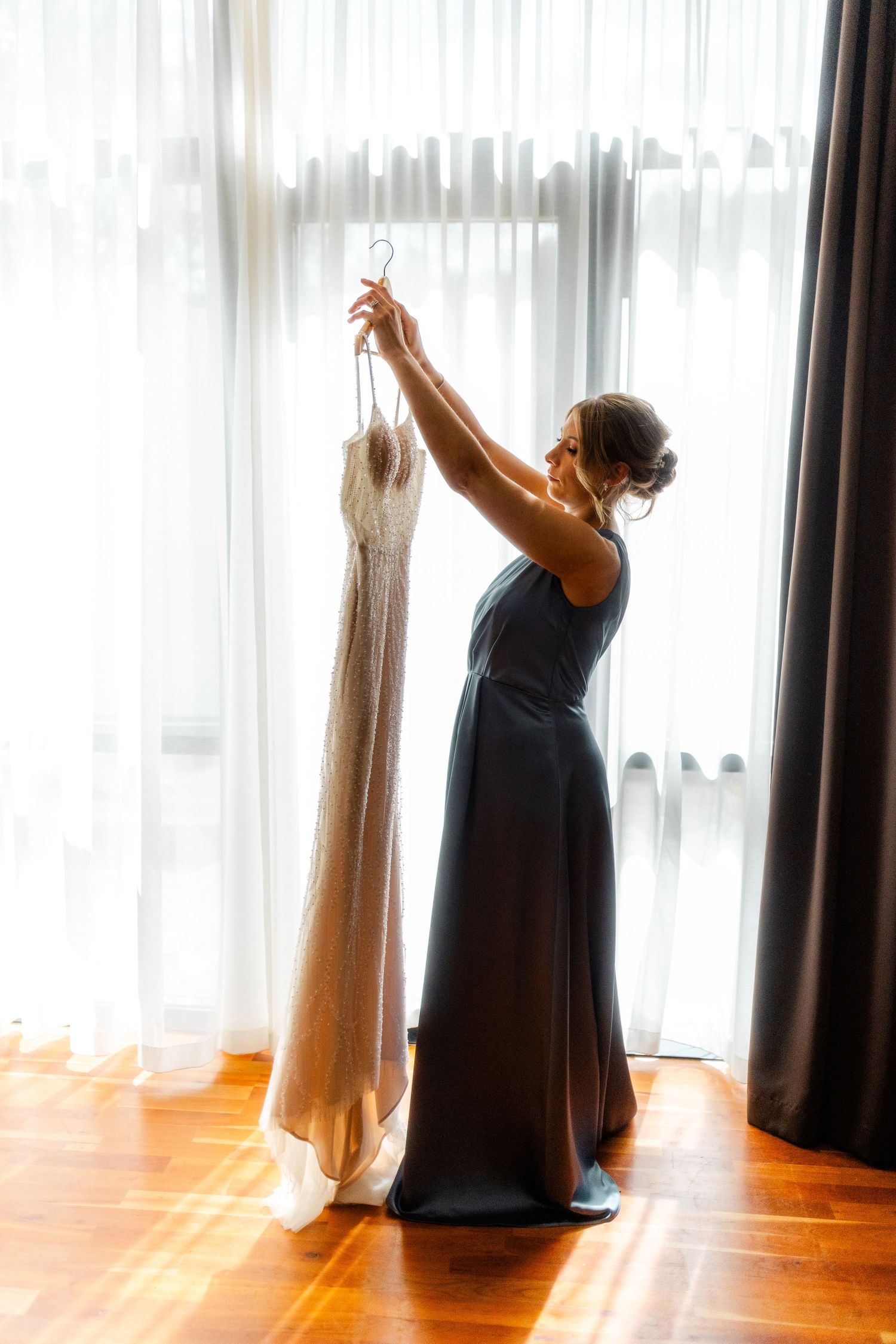 Maid of Honour with brides dress, Glass House Edinburgh, Scotland,