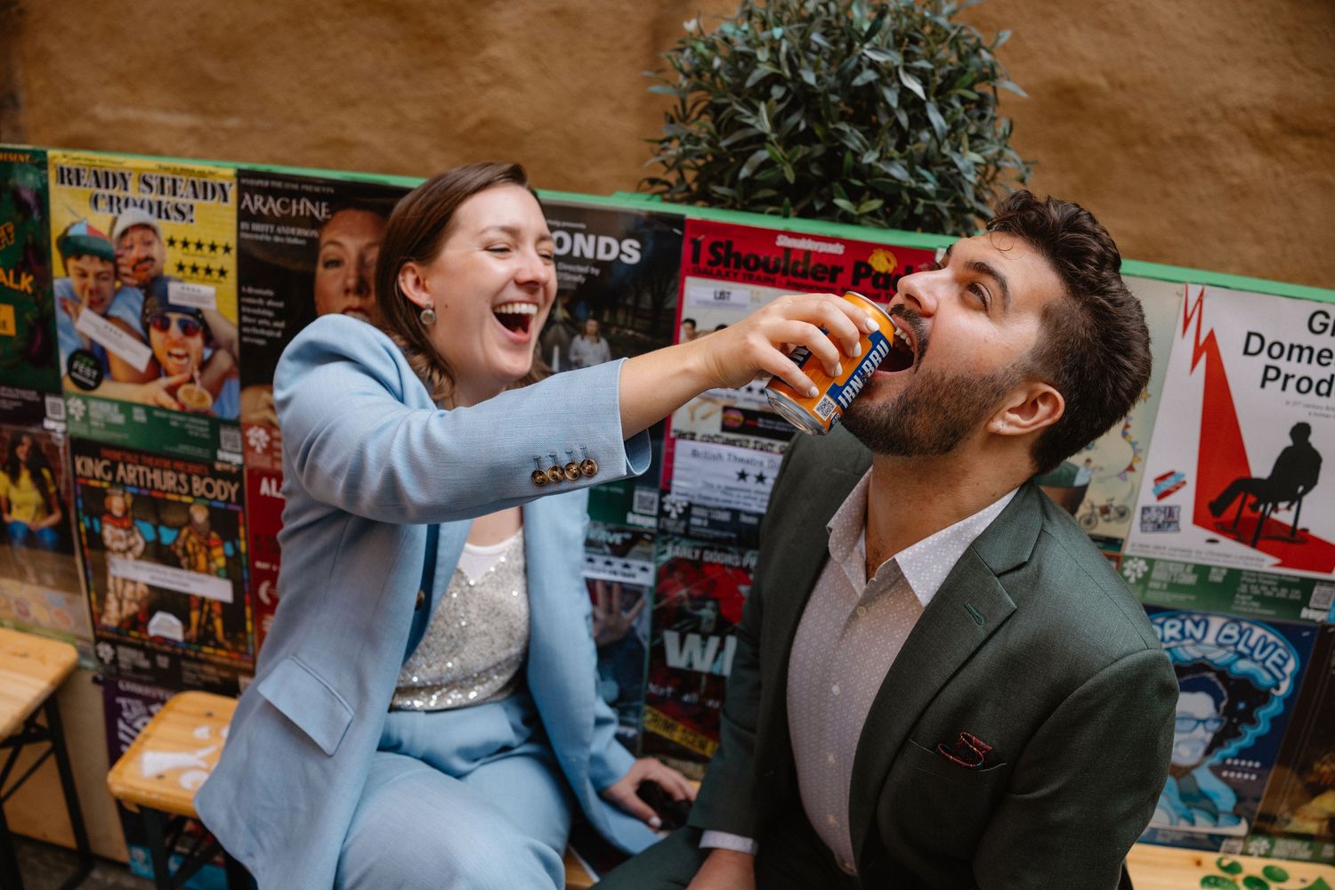 Bride and Groom drinking irn bru, photos city photos on in Edinburgh Scotland