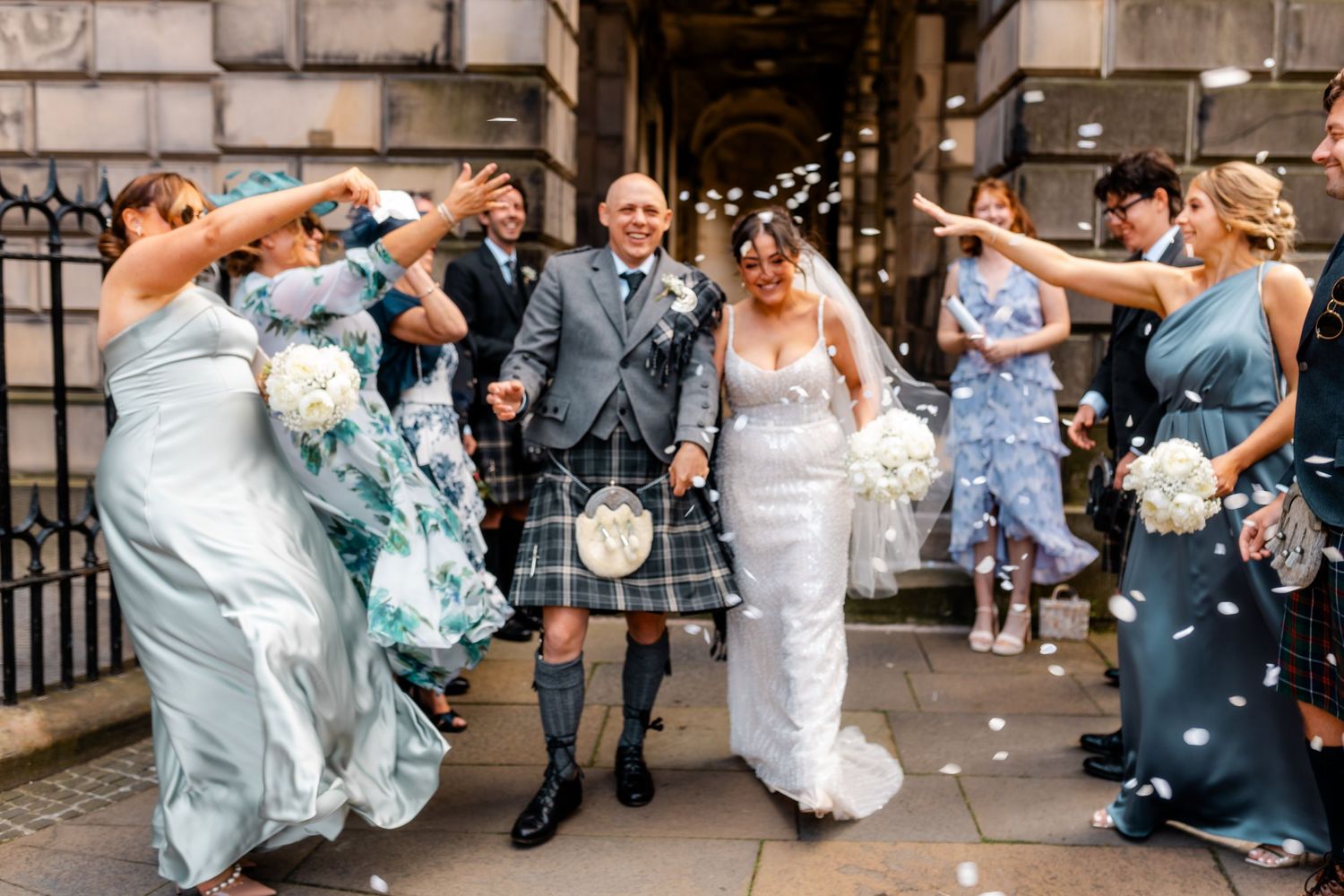Confetti toss outside City Chambers wedding in Edinburgh, Scotland,