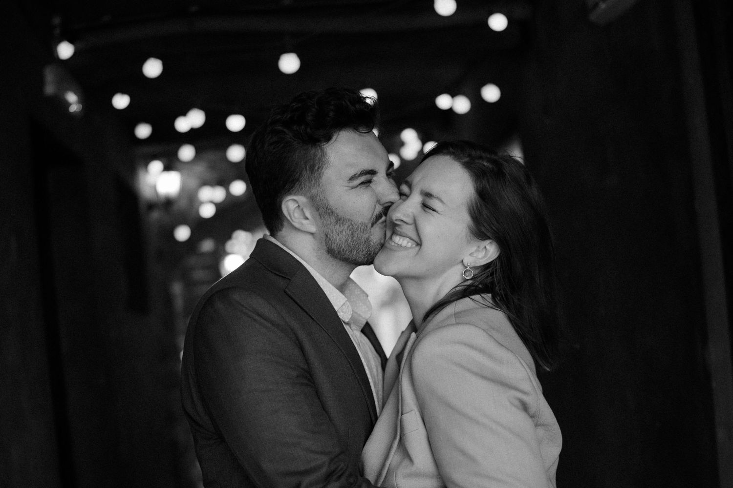 Bride and Groom kissing, black and white photos city photos on in Edinburgh Scotland