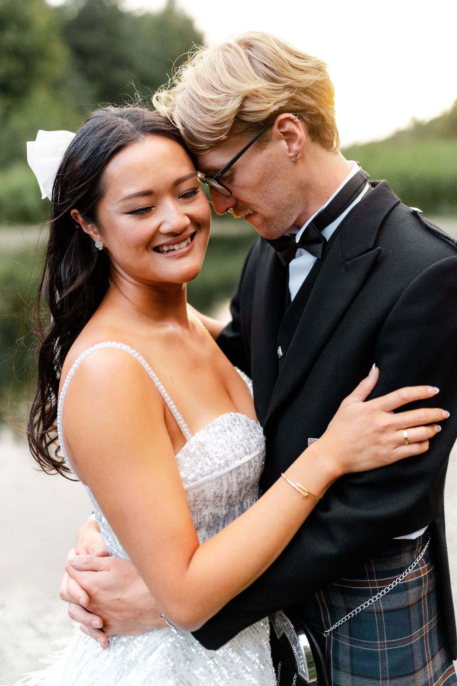 Romantic wedding portrait sequence showing tender moments between a couple in formal attire.