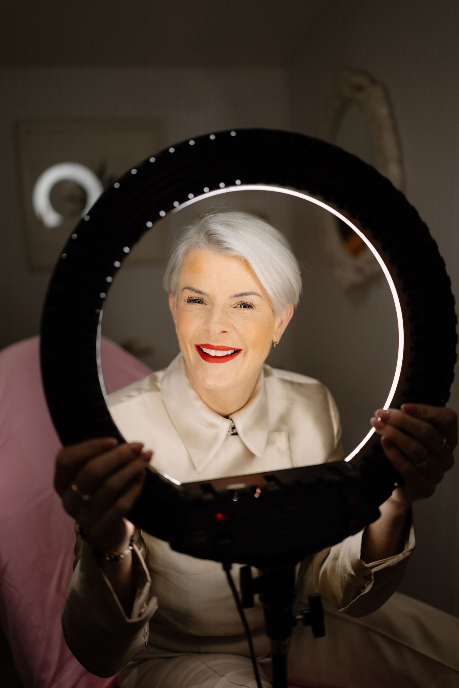 A creative photo sequence showing someone peering through a black circular frame with dramatic lighting and expressions.