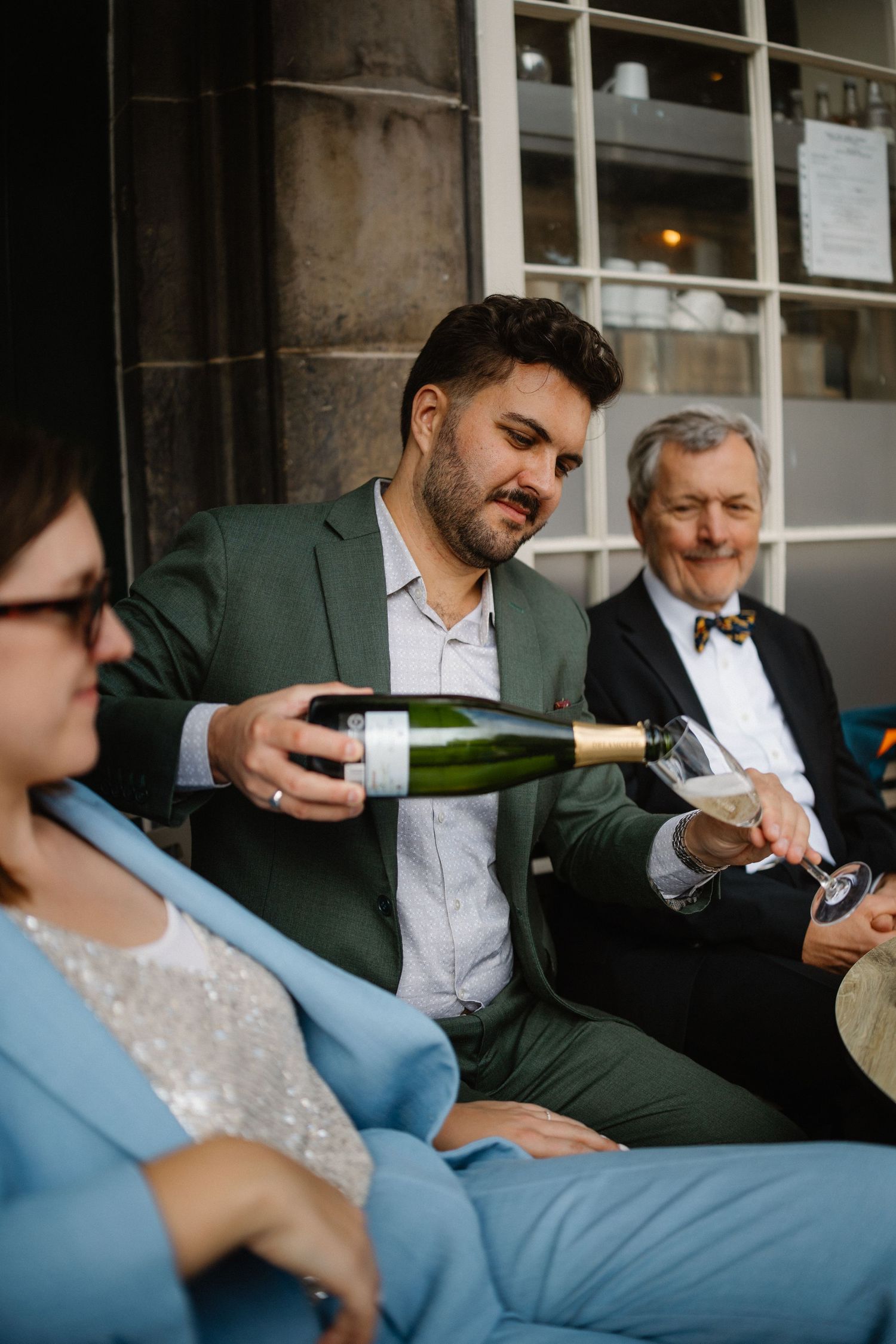 Wedding celebration with a glass of fizz in Scotts Restaurant in Edinburgh Scotland
