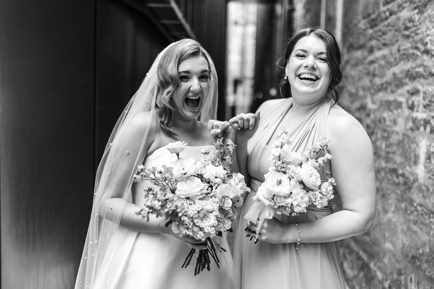Wedding  group photos, bride with friend Virgin hotel in Edinburgh City Scotland