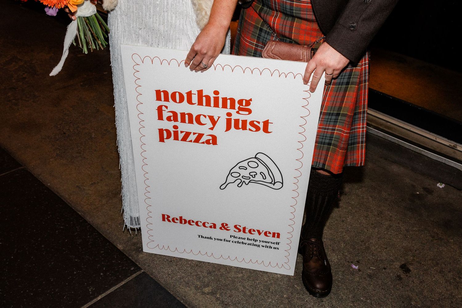 White cardboard pizza box with 'Nothing Fancy' text and custom wedding branding.