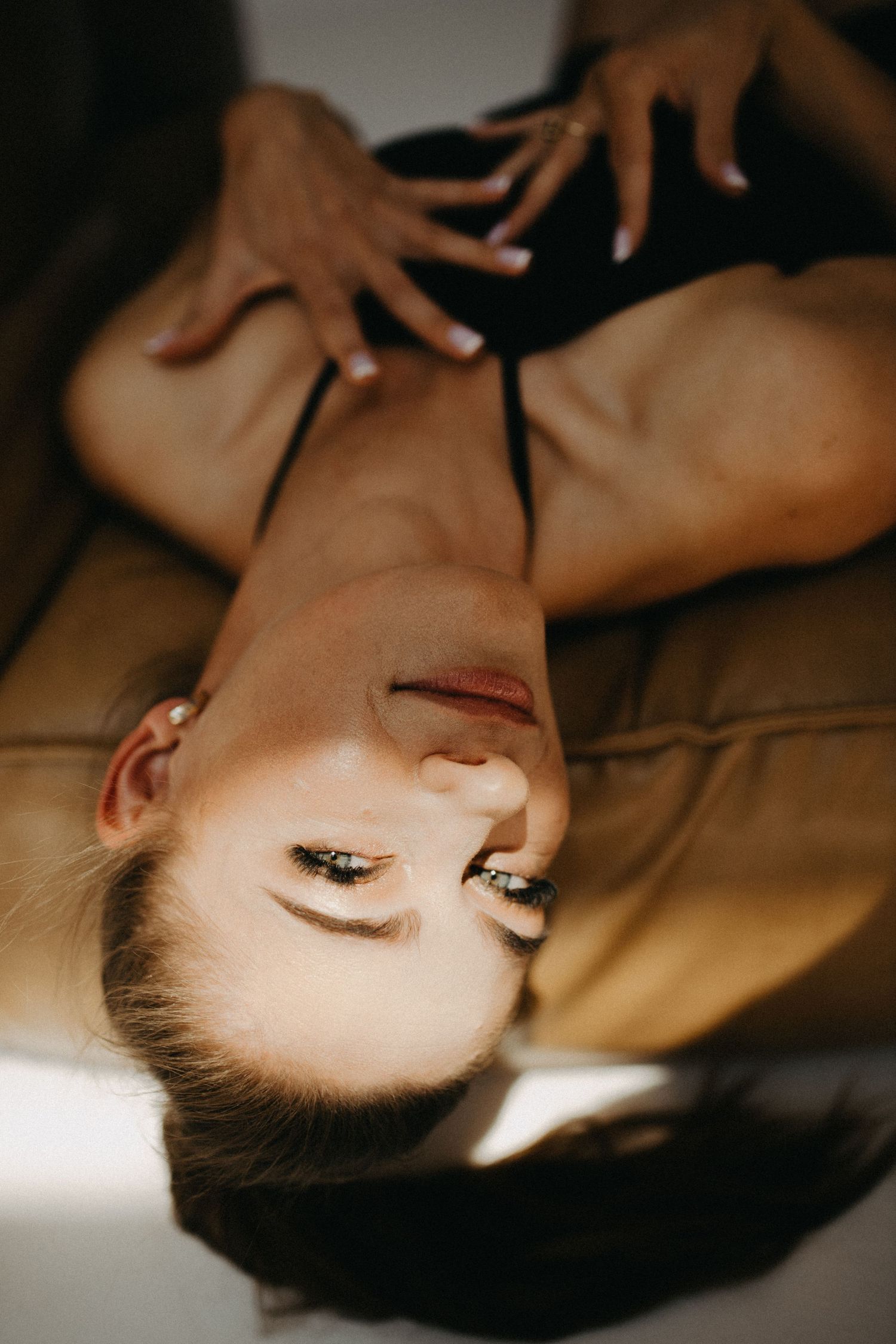 Close-up portrait series with dramatic lighting and makeup details.