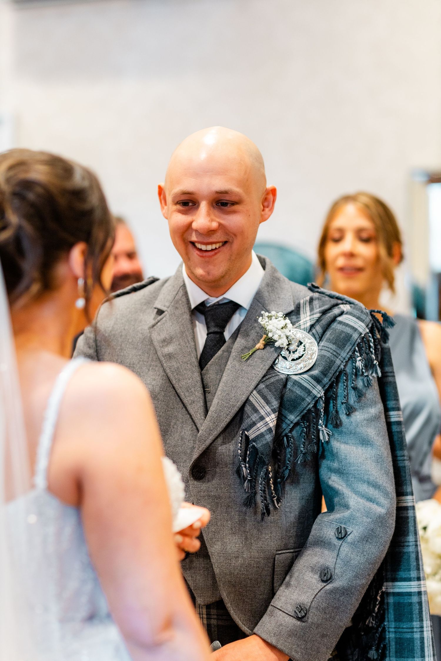 Married couple together inside City Chambers wedding in Edinburgh, Scotland,