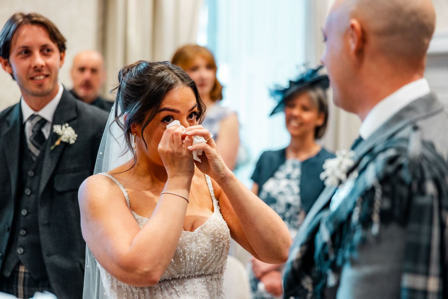 Bride crying,  City Chambers wedding in Edinburgh, Scotland,