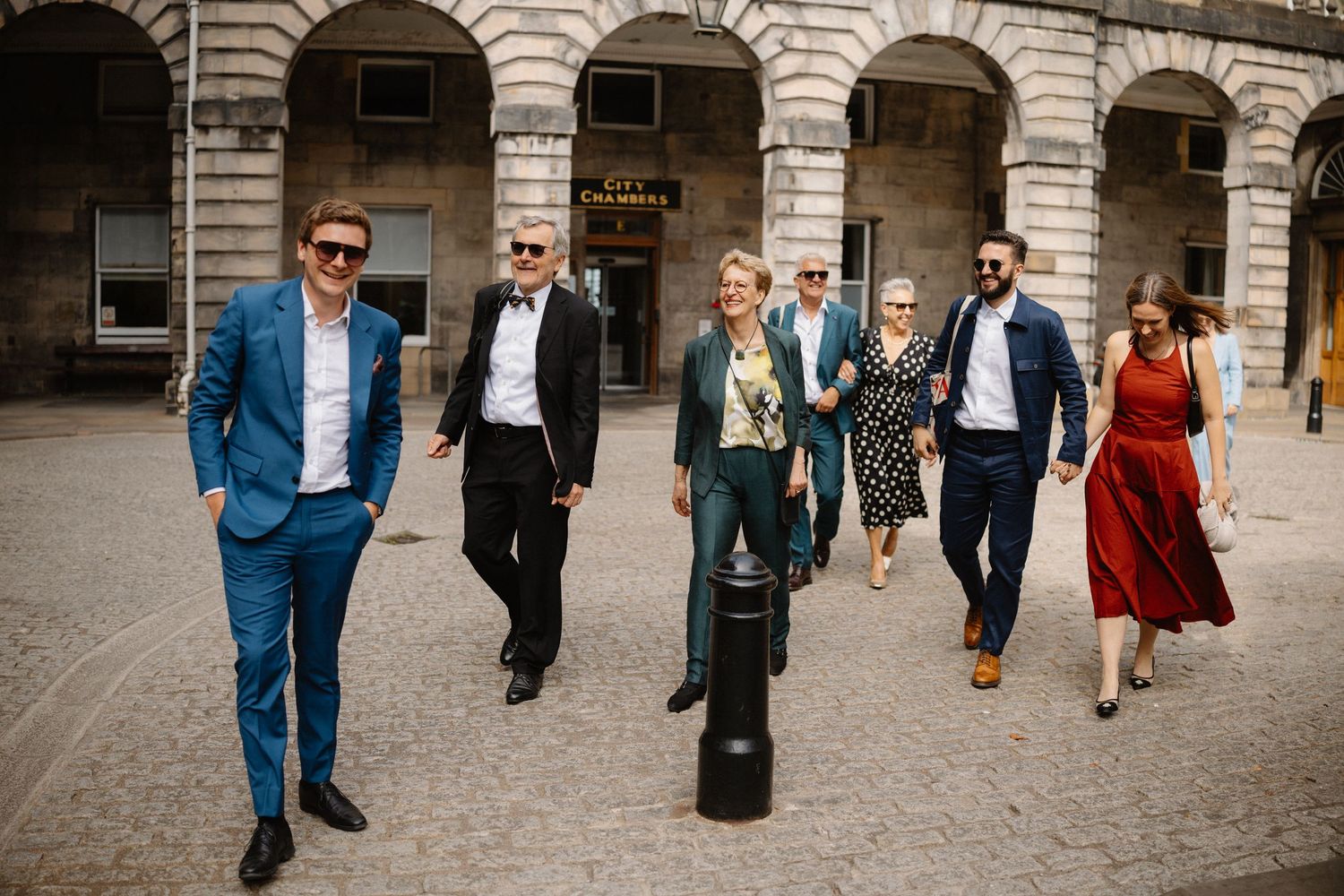 Edinburgh City Wedding Guest walking on the street outside the Edinburgh City Chambers