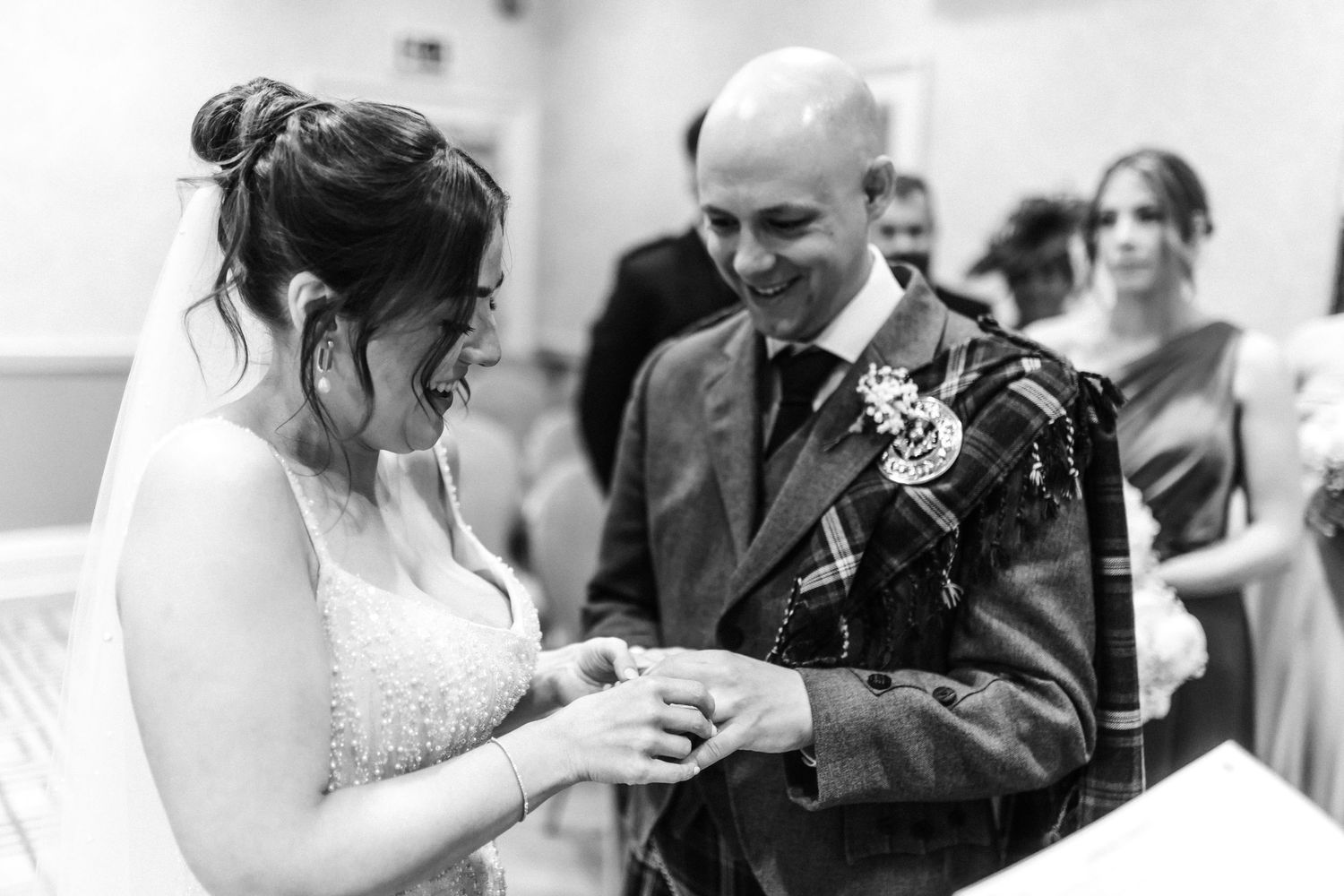 Ring exchange City Chambers wedding in Edinburgh, Scotland, black and white