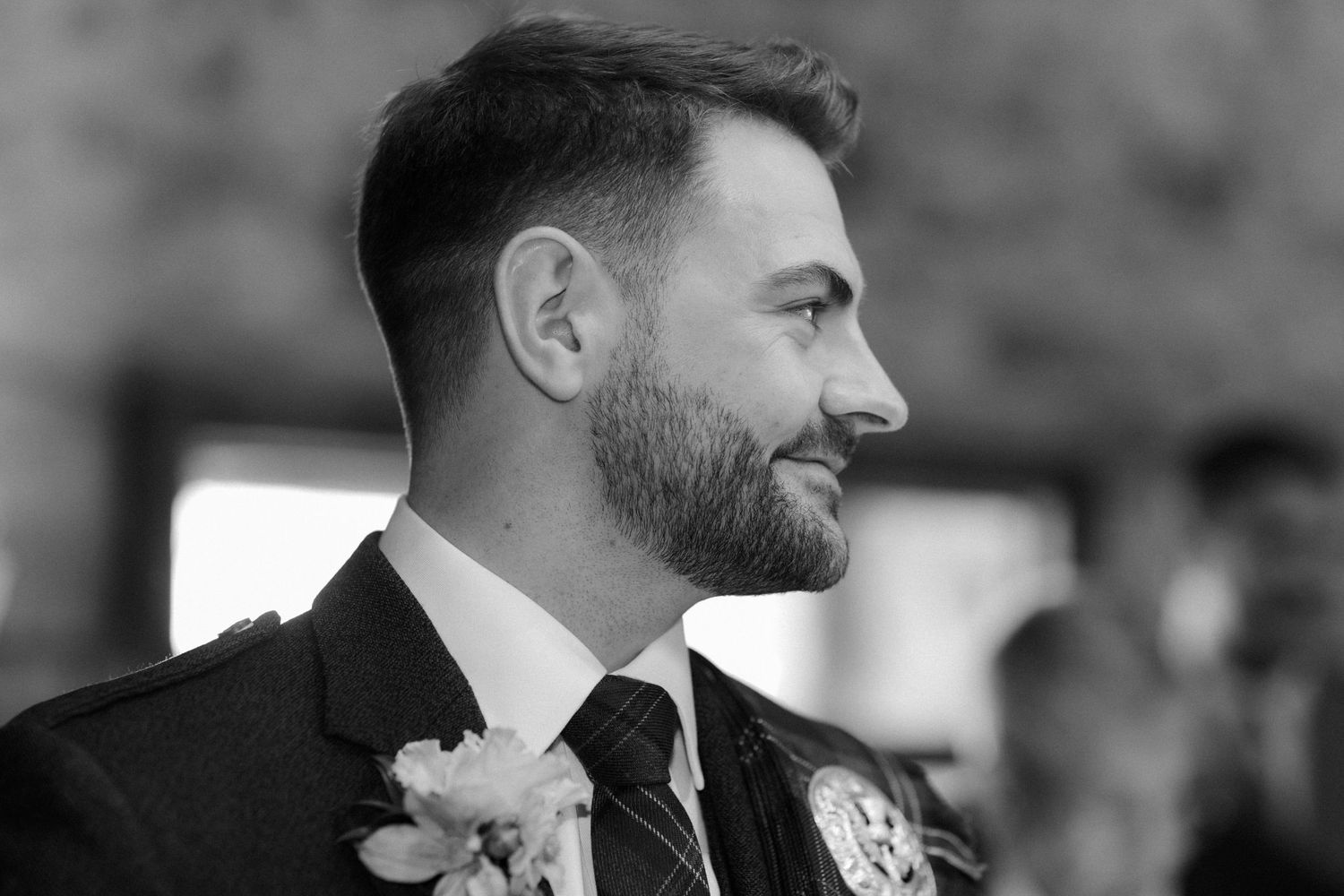 Wedding ceremony, grooms look down the isle, at Rosebery Steading, Temple, Gorebridge, Scotland.