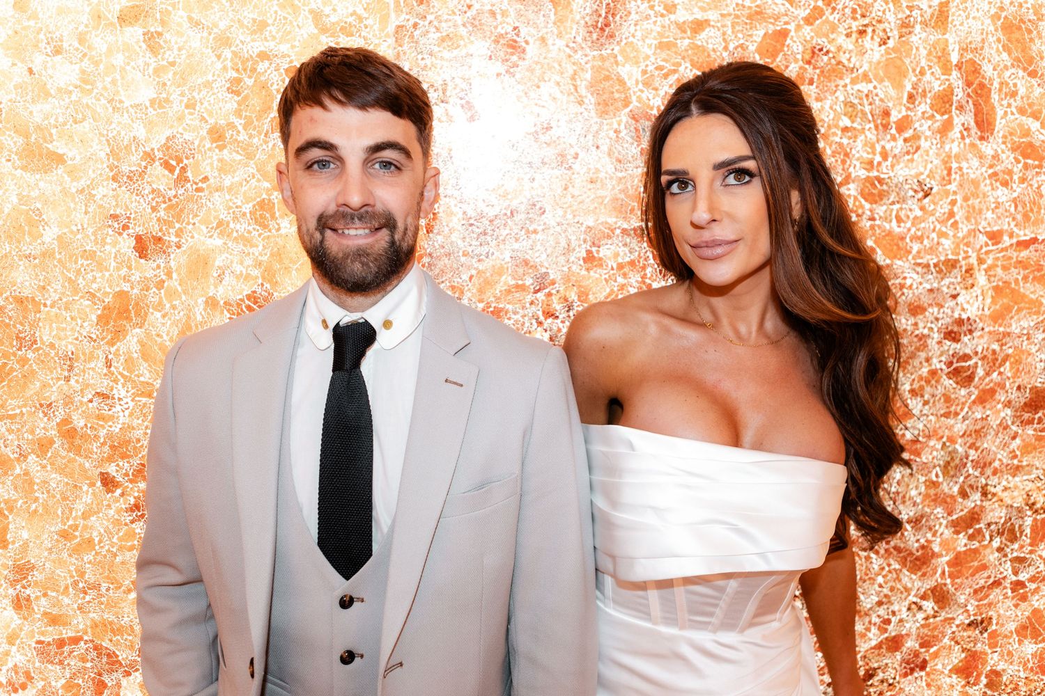 Wedding couple poses against a textured orange wall in a stylish photo sequence.