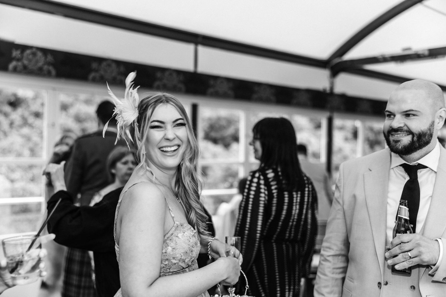 Guests having fun, smiling, wedding, Glass House Edinburgh City Scotland,