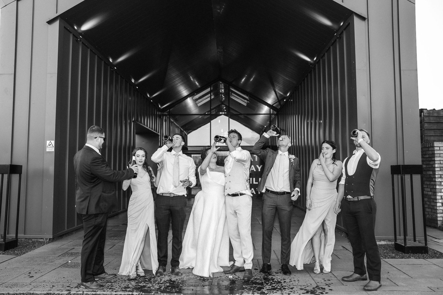Wedding group photos with champagne spray, Whitekirk Hill, Whitekirk, North Berwick