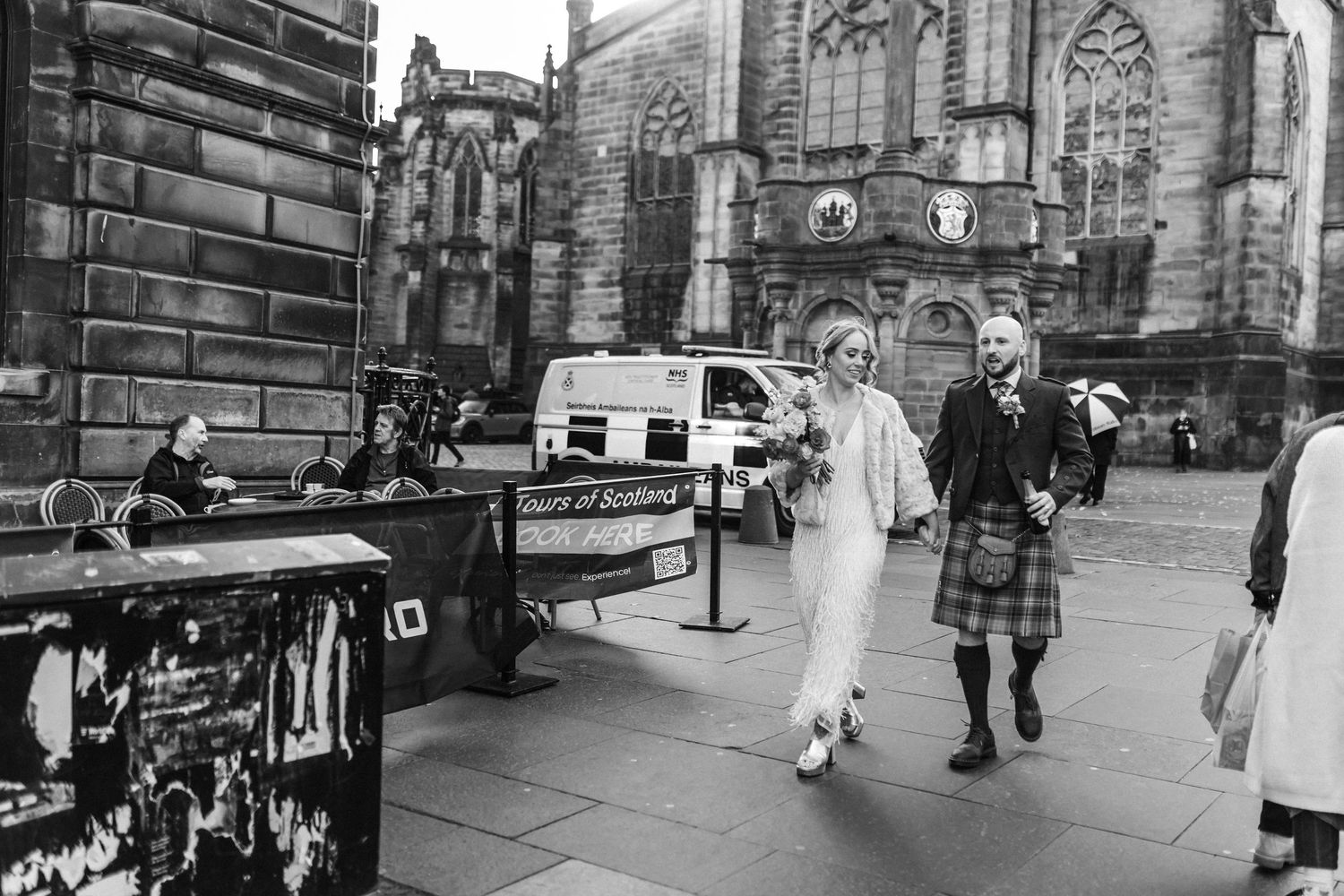 Historic architecture and stone buildings line the streets of Edinburgh's Old Town.