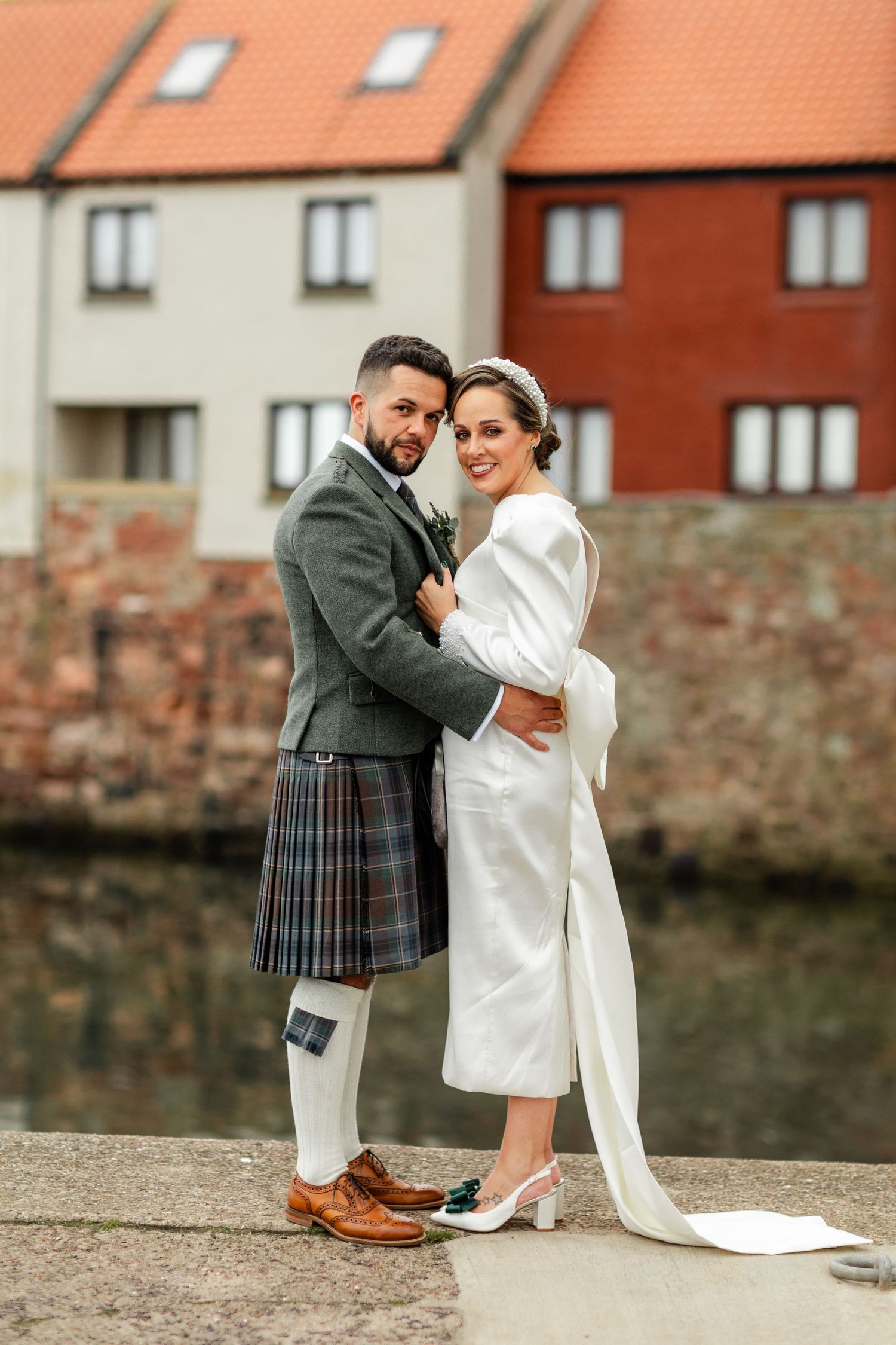 A romantic wedding moment captured in a series of photos showing a couple in traditional Scottish and white attire.