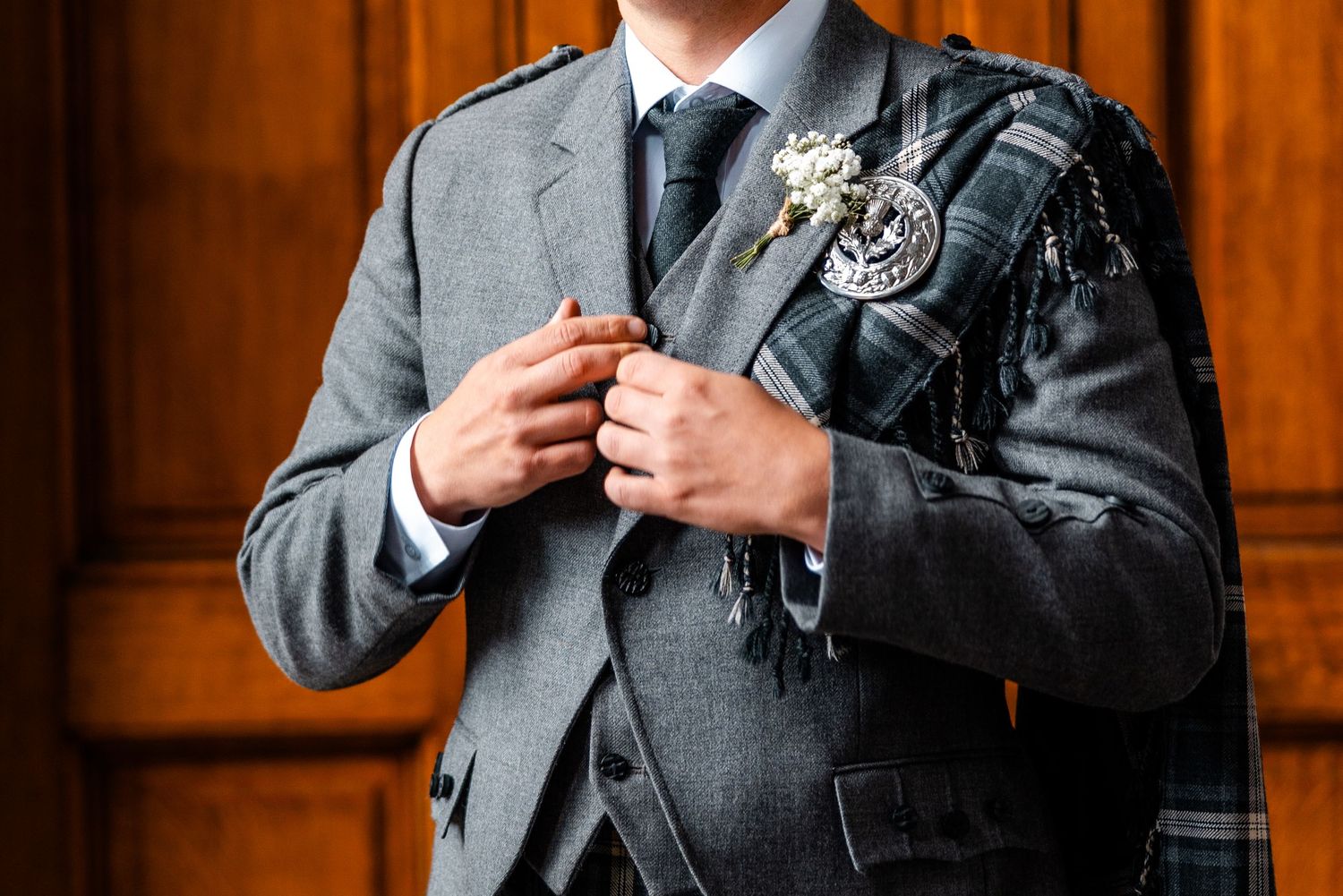 The groom wearing lovely kilt inside City Chambers wedding in Edinburgh, Scotland,