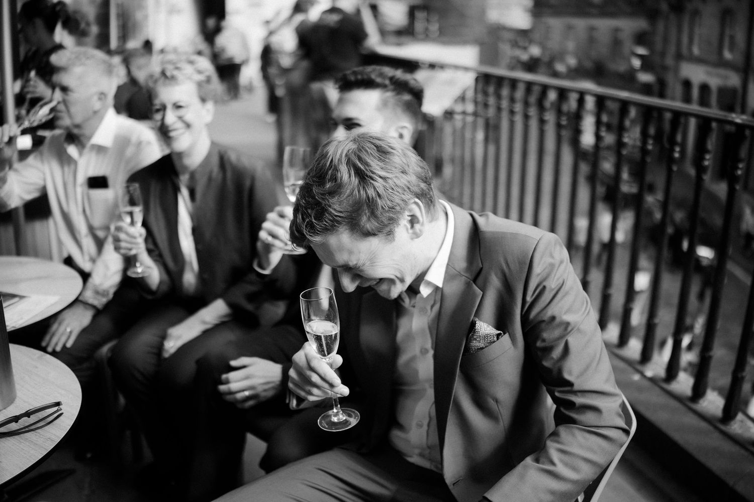 Wedding celebration with a glass of fizz in Scotts Restaurant in Edinburgh Scotland