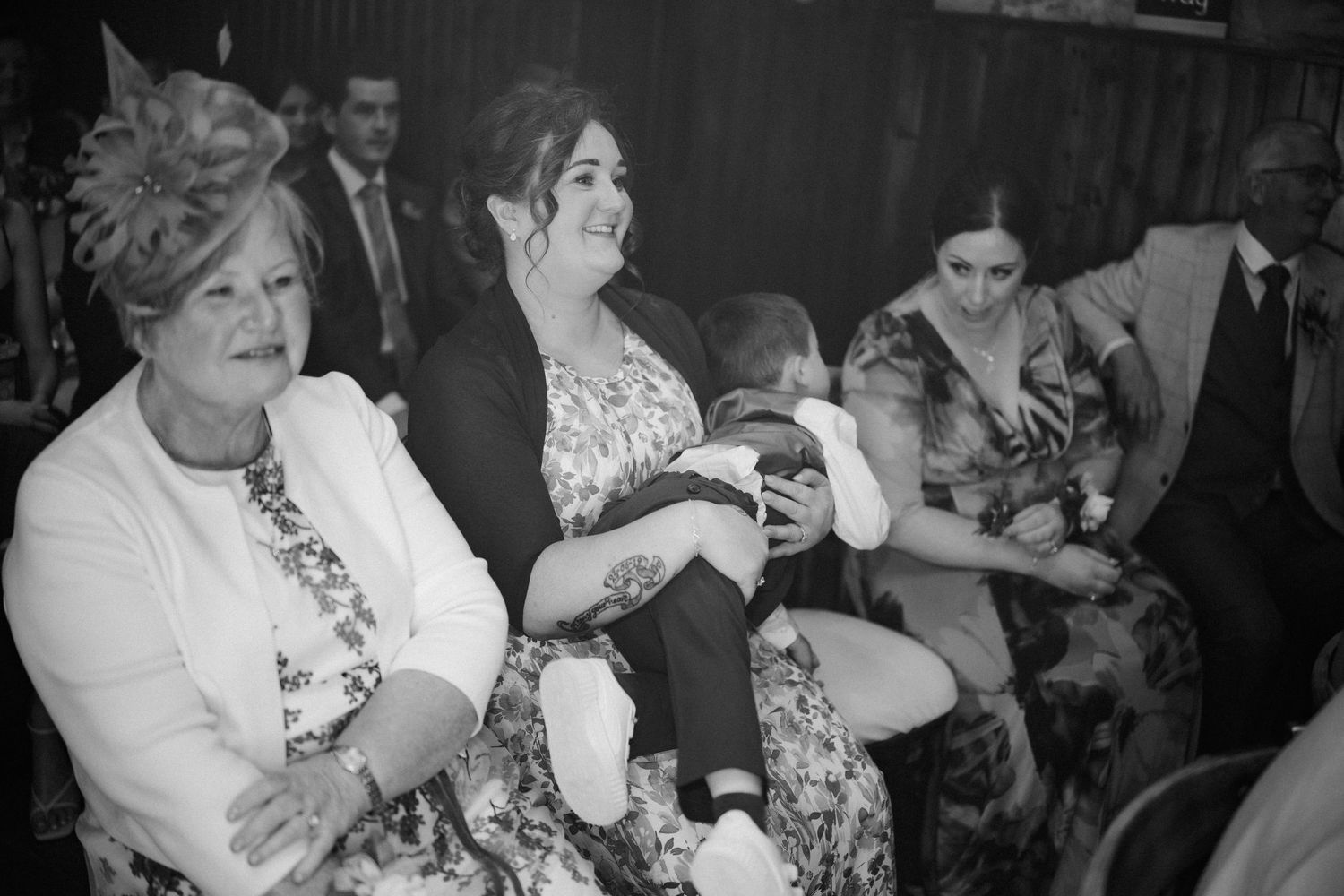 Wedding ceremony guests, at Rosebery Steading, Temple, Gorebridge, Scotland.