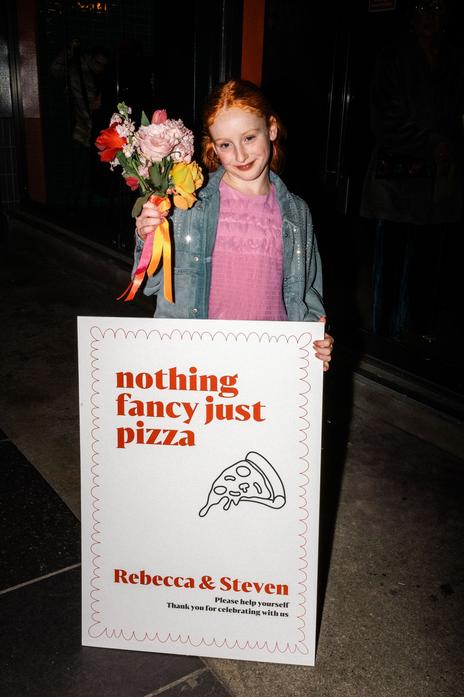 Pizza delivery box with text reading 'nothing fancy just pizza' for wedding reception.