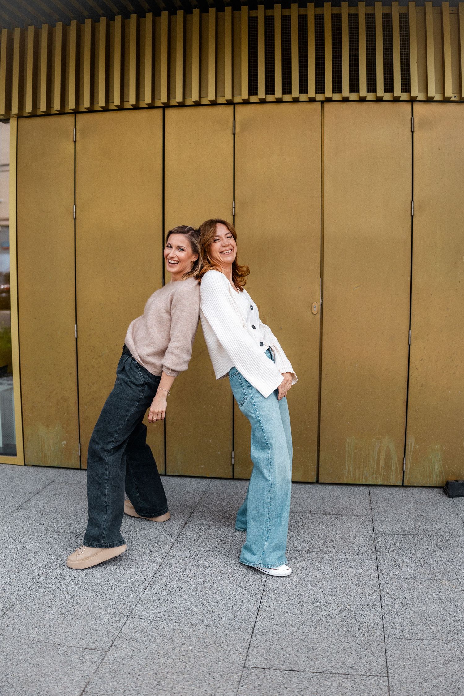 Sequence of playful poses against a gold paneled wall.