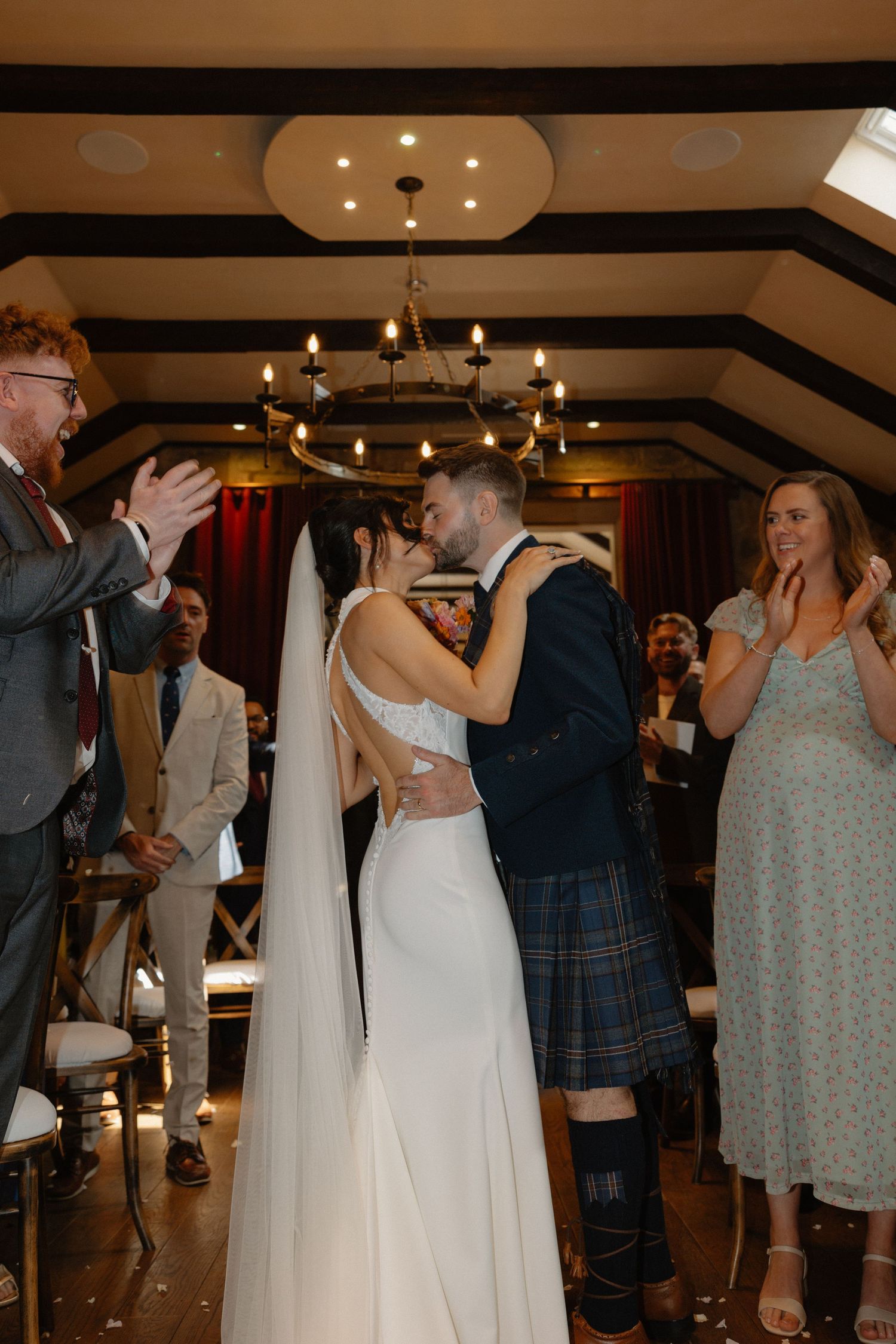 Wedding ceremony, kiss down the isle, at Rosebery Steading, Temple, Gorebridge, Scotland.