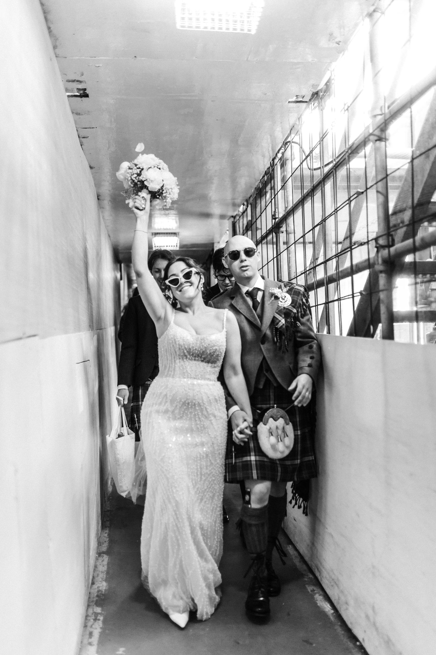 bride and groom, walking, dancing, fun photos, Edinburgh City Scotland,