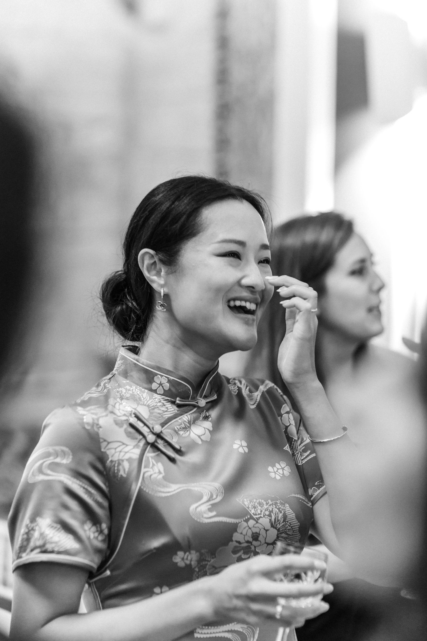 Black and white candid shots of laughter and joy during celebration.