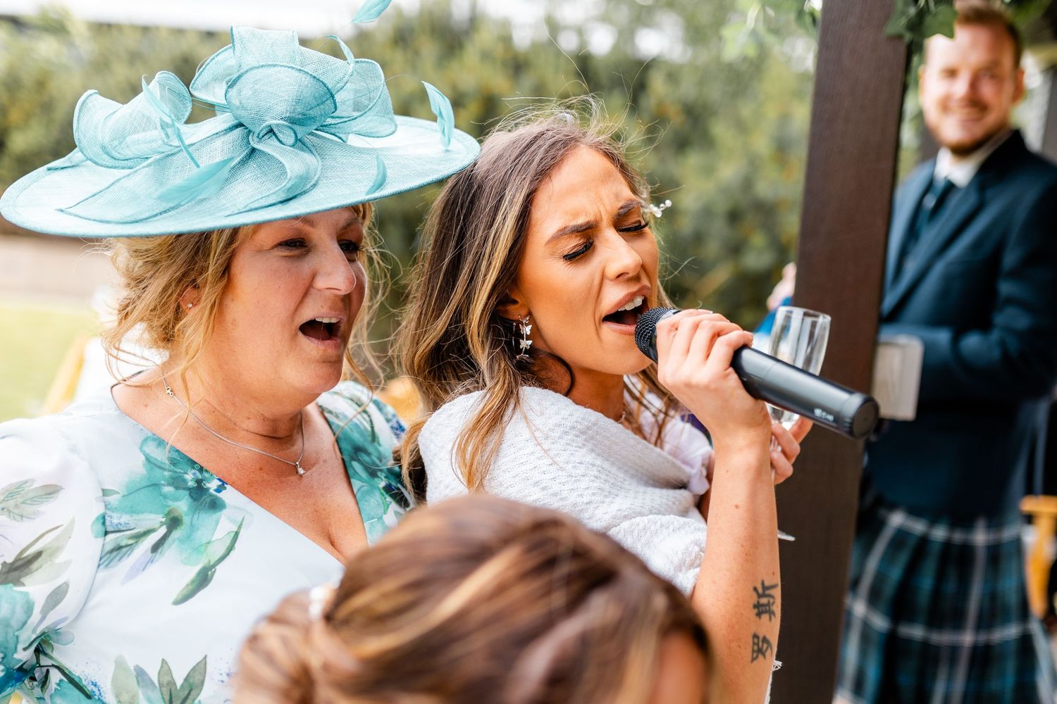 singing guests, outdoor wedding, Glass House Edinburgh City Scotland,