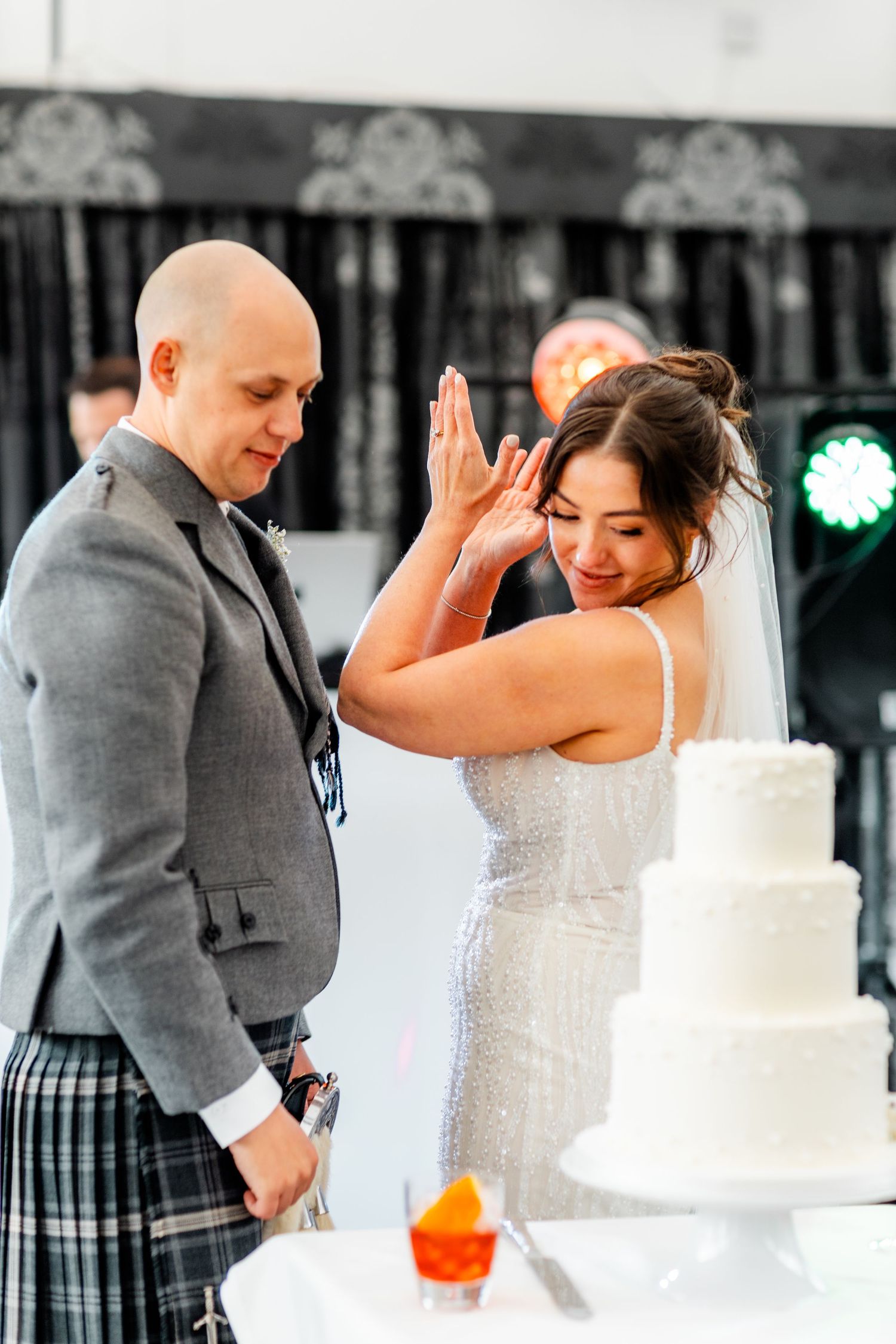 Bride and groom with wedding cake, wedding, Glass House Edinburgh City Scotland,