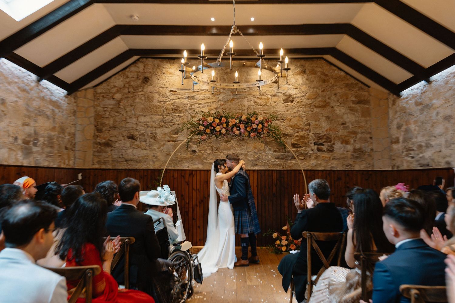 Wedding ceremony, first kiss, at Rosebery Steading, Temple, Gorebridge, Scotland.